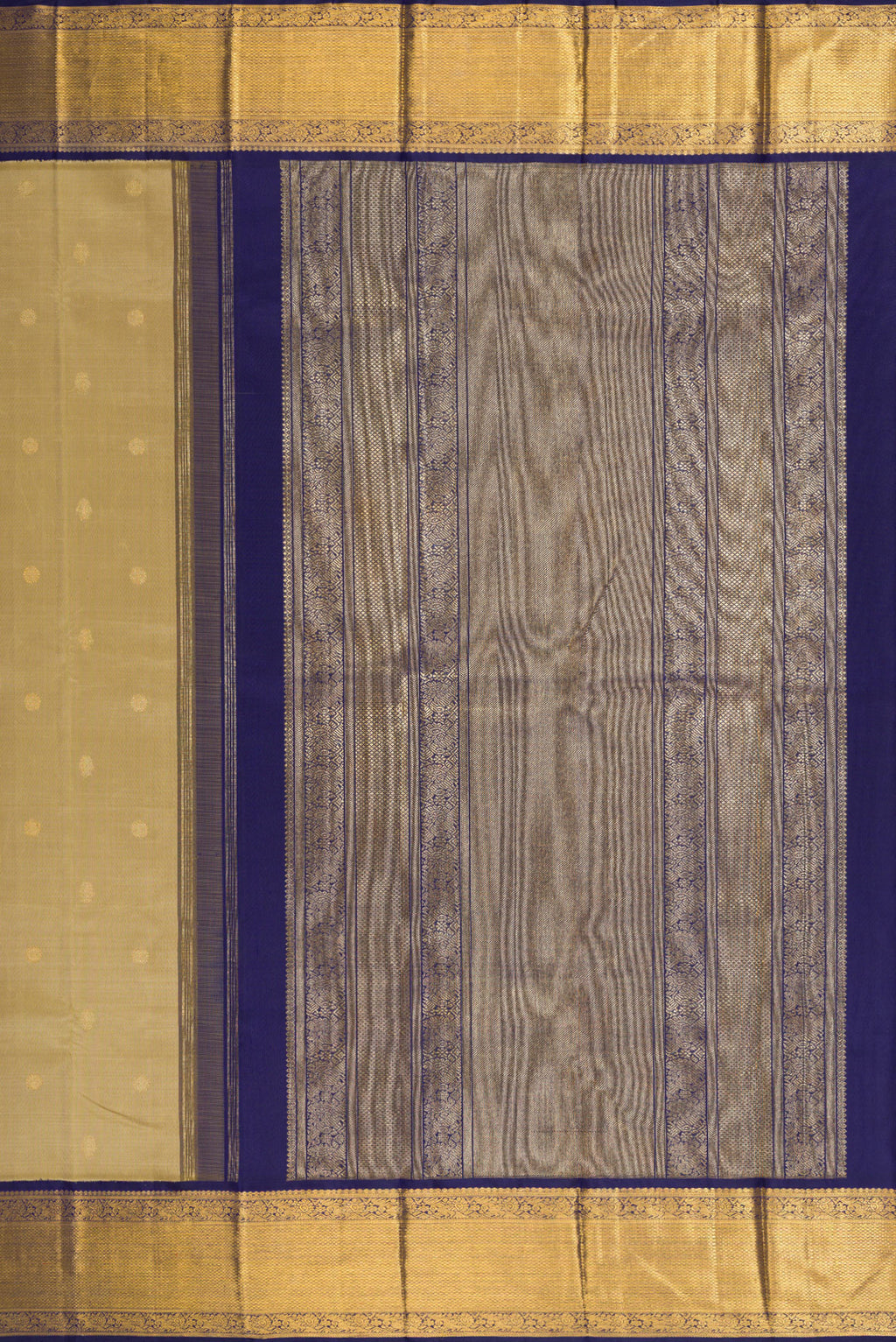 Close up image of the pallu of Pure Silk Pure Zari Dark Beige Kanjivaram Saree with Zari Butta on the body and Zari Border. 