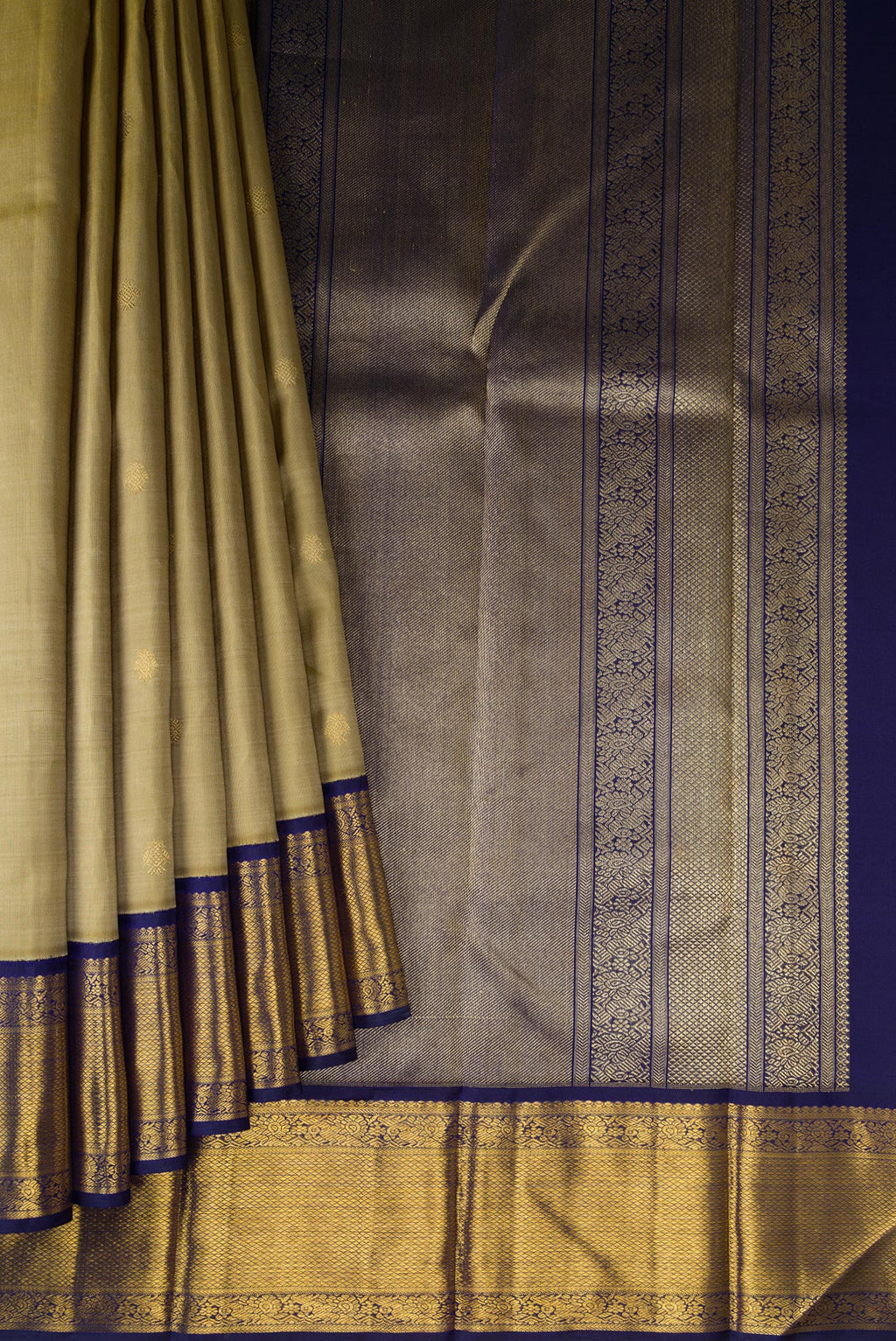 Pleats and pallu of Pure Silk Pure Zari Dark Beige Kanjivaram Saree with Zari Butta on the body and Zari Border. 