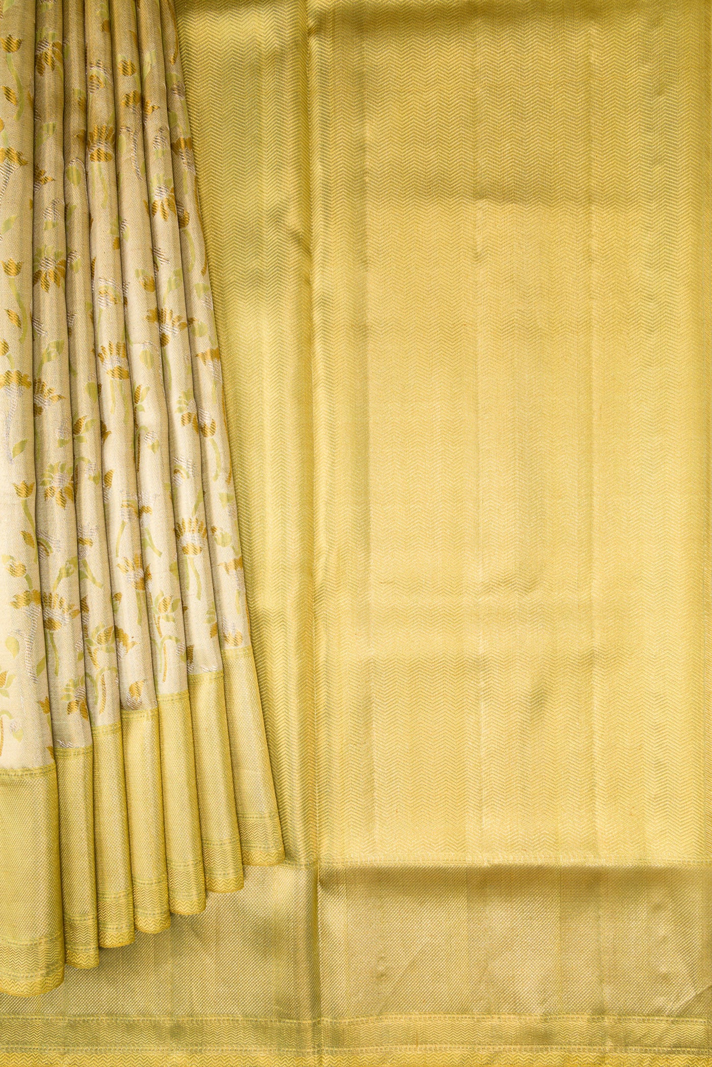 Pleats and pallu of Pista Green Dual Tone Kanjivaram Tissue Silk Saree with Zari Brocade on the body and Zari Border. 
