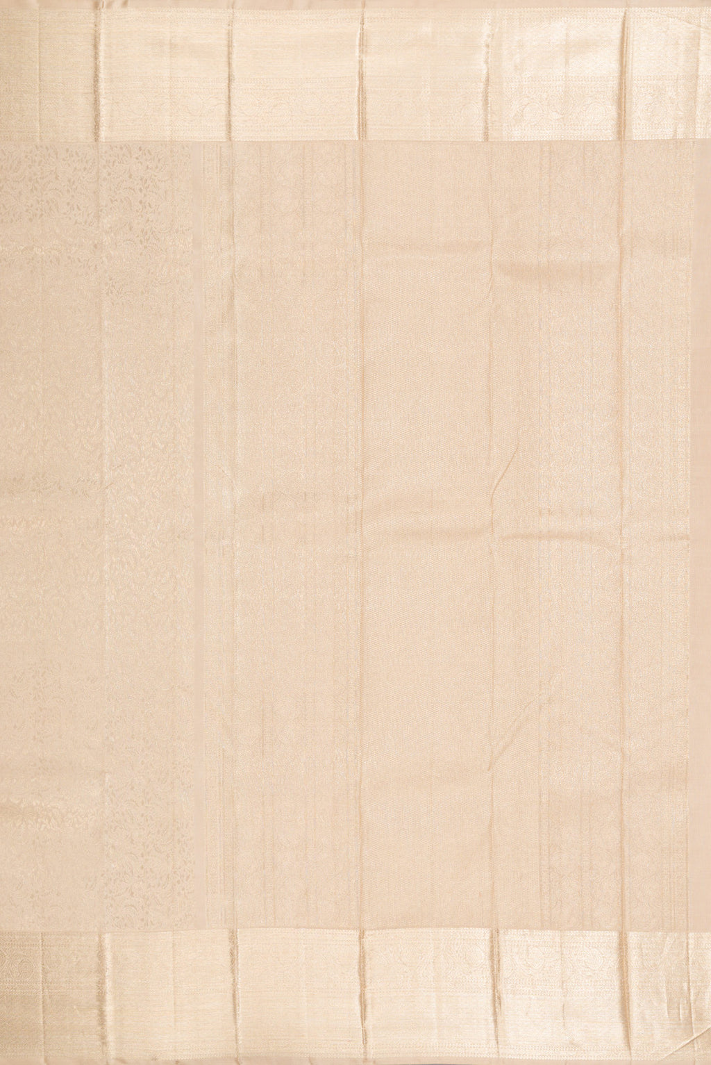 Close up image of the pallu of Beige Kanchipuram Silk Saree with Zari Brocade on the body and Zari Border. 