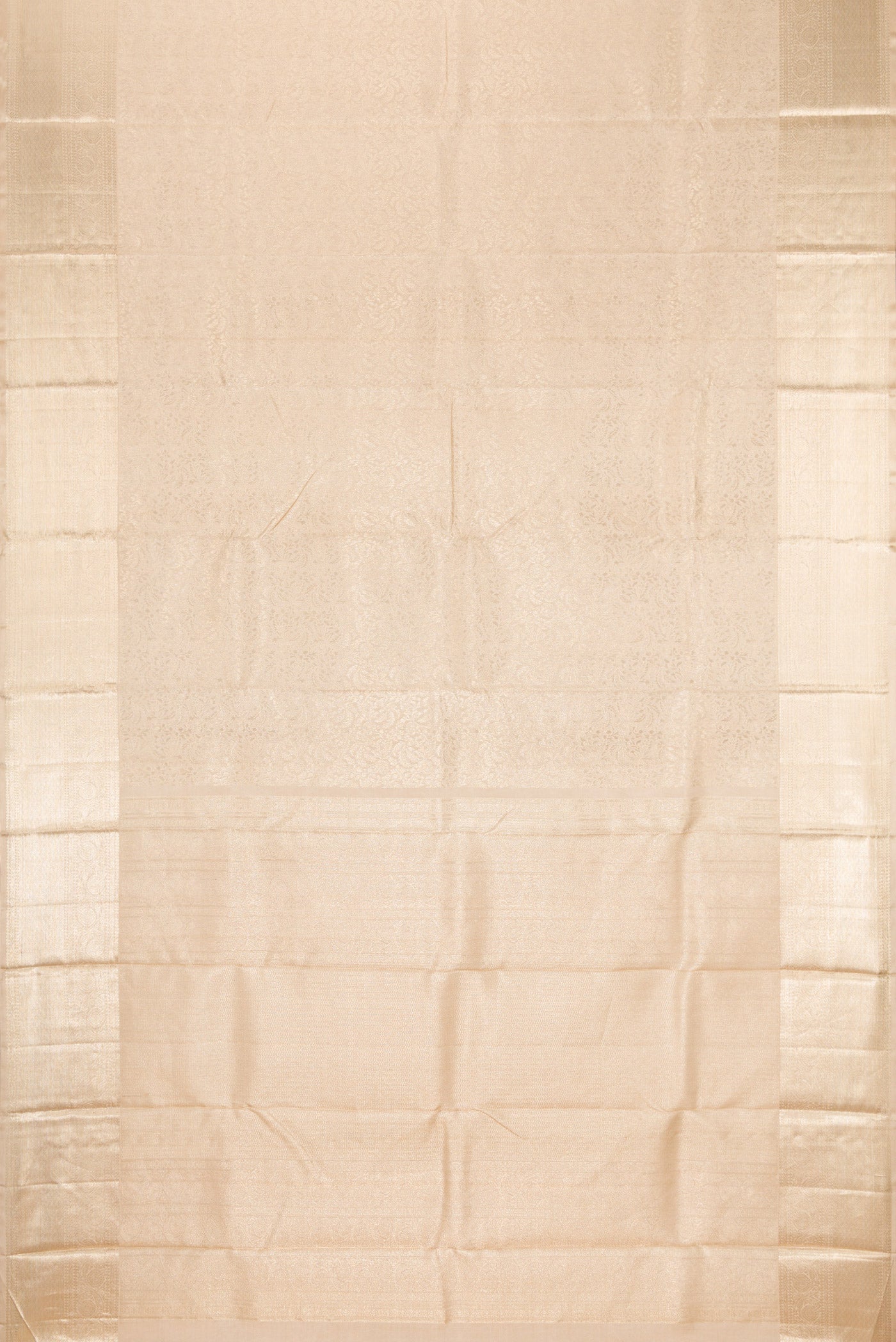 Flat view of Beige Kanchipuram Silk Saree with Zari Brocade on the body and Zari Border. 