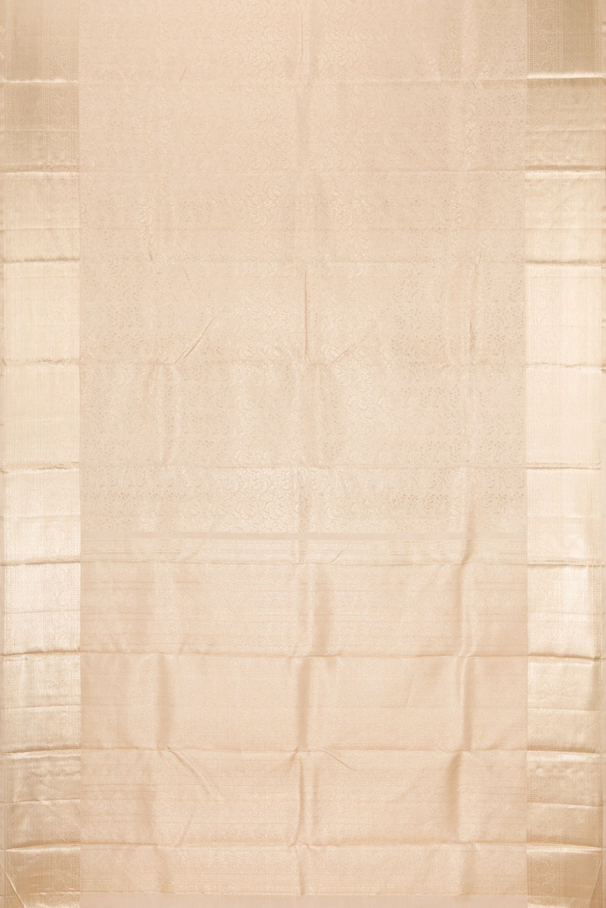 Flat view of Beige Kanchipuram Silk Saree with Zari Brocade on the body and Zari Border. 