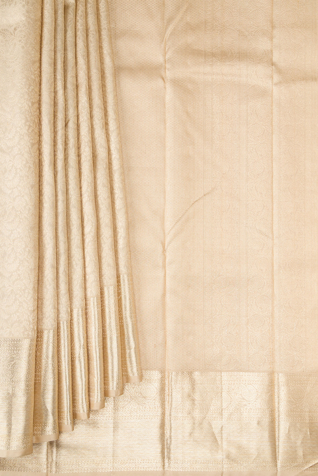Pleats and pallu of Beige Kanchipuram Silk Saree with Zari Brocade on the body and Zari Border. 