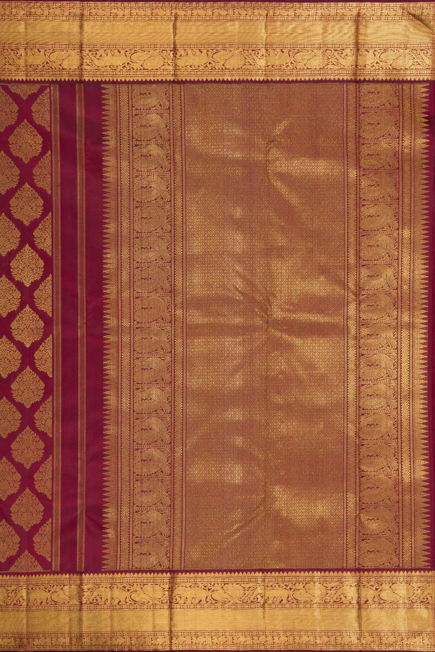 Close up image of the pallu of Pure Silk Pure Zari Maroon Dual Tone Kanjivaram Saree with Zari Brocade on the body and Zari Border. 
