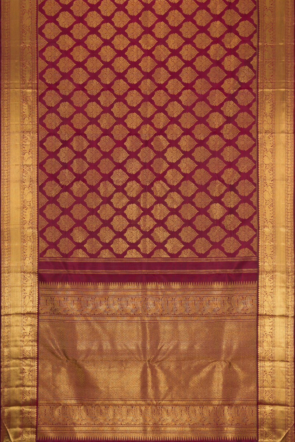 Flat view of Pure Silk Pure Zari Maroon Dual Tone Kanjivaram Saree with Zari Brocade on the body and Zari Border. 