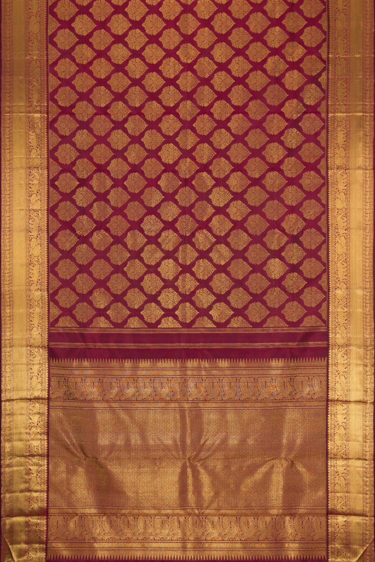 Flat view of Pure Silk Pure Zari Maroon Dual Tone Kanjivaram Saree with Zari Brocade on the body and Zari Border. 