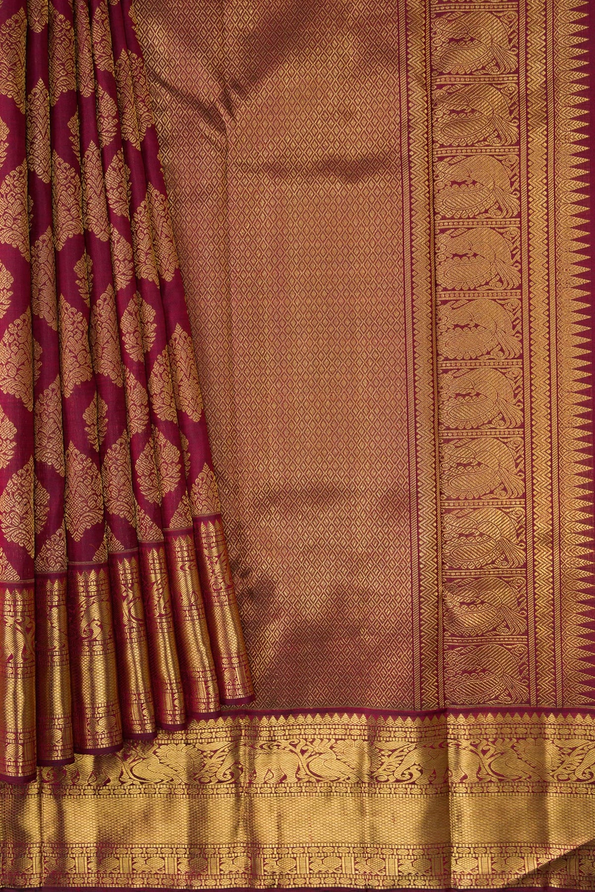 Pleats and pallu of Pure Silk Pure Zari Maroon Dual Tone Kanjivaram Saree with Zari Brocade on the body and Zari Border. 