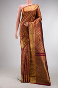 Pure Silk Pure Zari Maroon Dual Tone Kanjivaram Saree with Zari Brocade on the body and Zari Border.  displayed on a mannequin