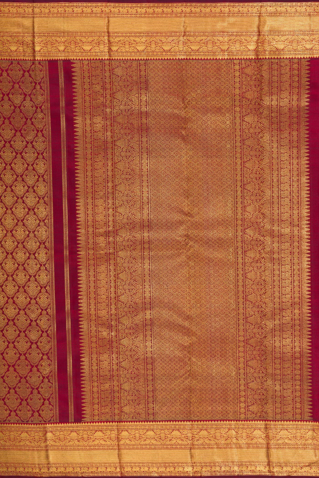 Close up image of the pallu of Pure Silk Pure Zari Maroon Dual Tone Kanjivaram Saree with Zari Brocade on the body and Zari Border. 
