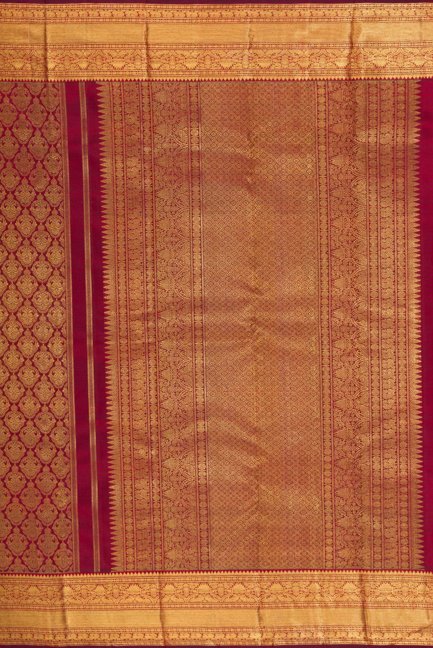 Close up image of the pallu of Pure Silk Pure Zari Maroon Dual Tone Kanjivaram Saree with Zari Brocade on the body and Zari Border. 