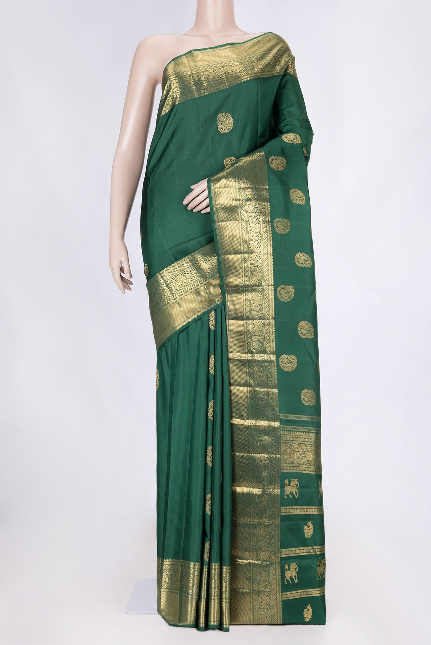 Pure Silk Pure Zari Bottle Green Dual Tone Kanchipuram Saree with Zari Butta on the body and Zari Border displayed on a mannequin