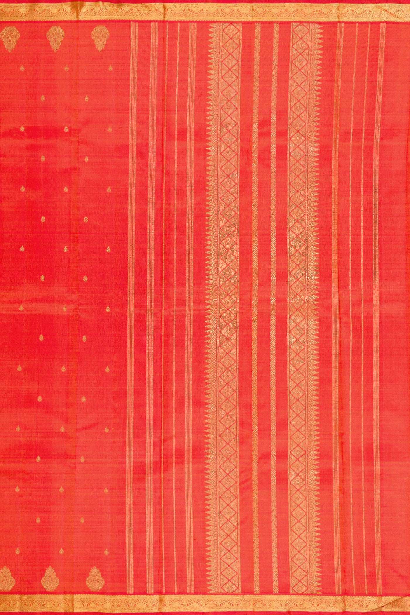 Close up image of the pallu of Orange Dual Tone Kanchipuram Silk Saree with Zari Butta on the body and Fancy Border. 