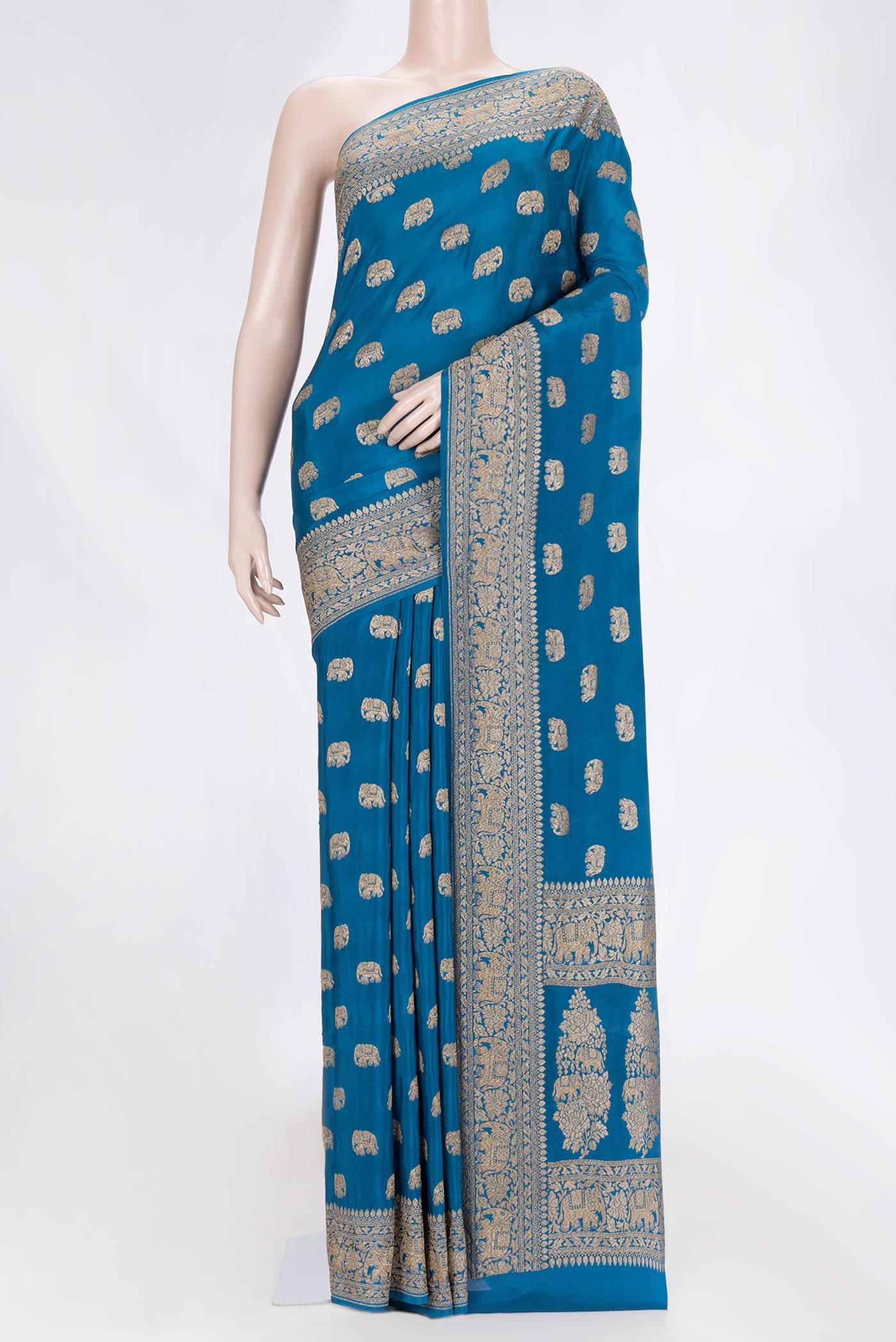 Sky Blue Dual Tone Banarasi Silk Saree with Zari Butta on the body and Zari Border.  displayed on a mannequin