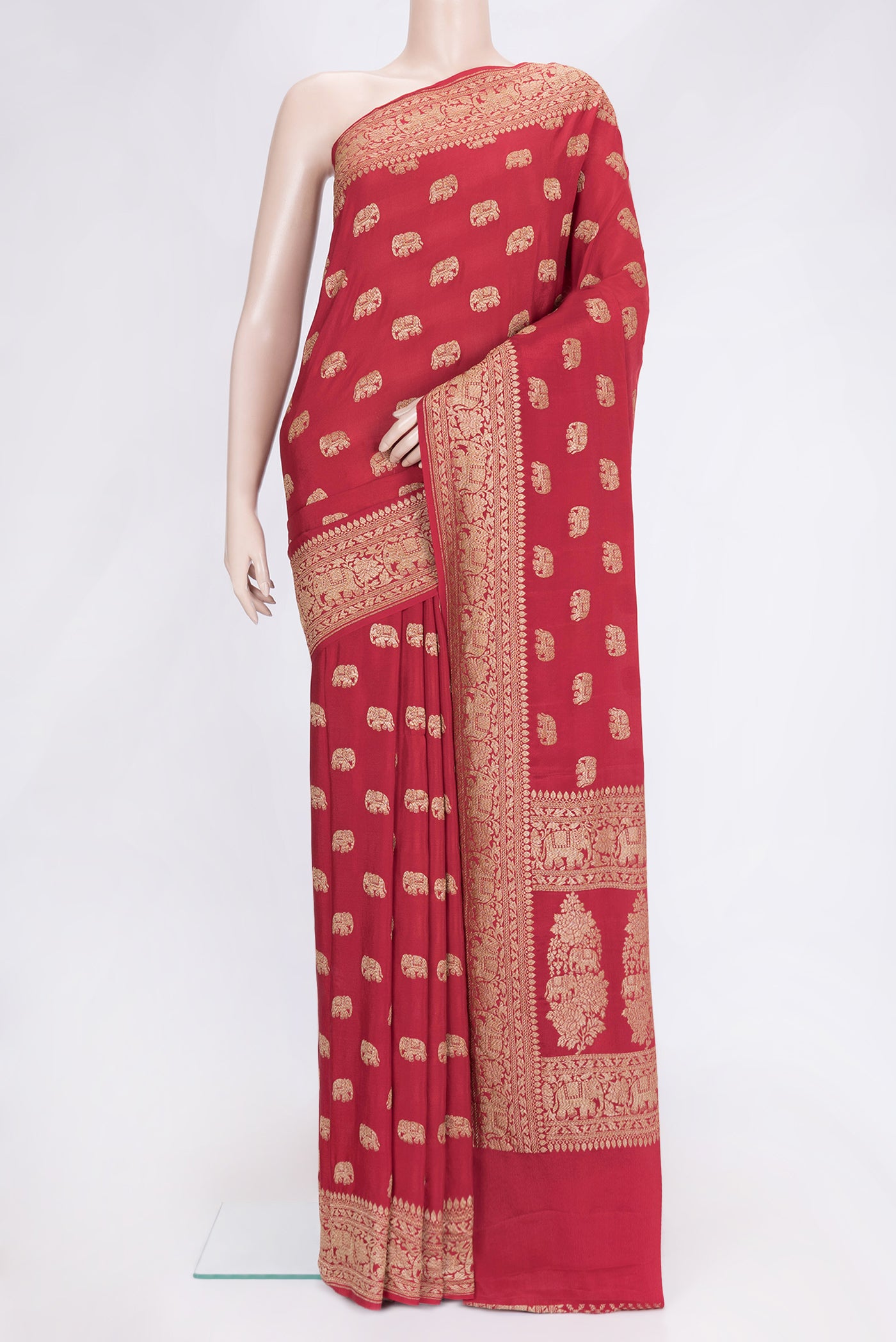 Red Dual Tone Banarasi Georgette Saree with Zari Butta on the body and Zari Border.  displayed on a mannequin