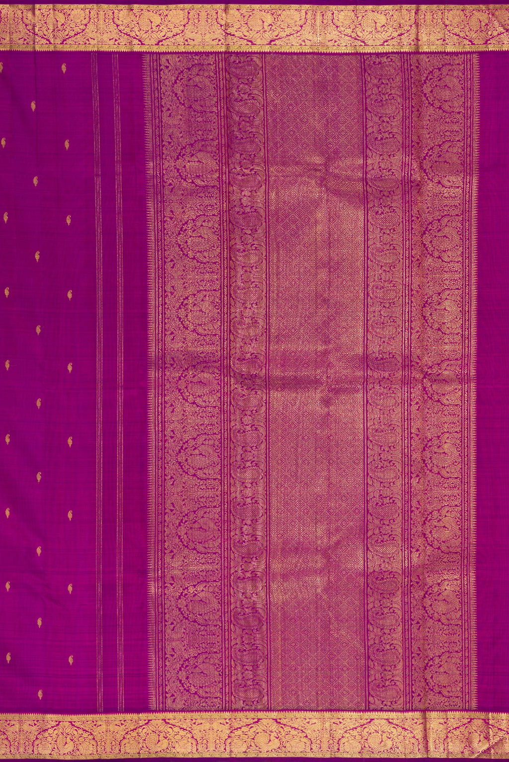 Close up image of the pallu of Pure Silk Pure Zari Purple Kanchipuram Saree with Zari Butta on the body and Zari Border. 