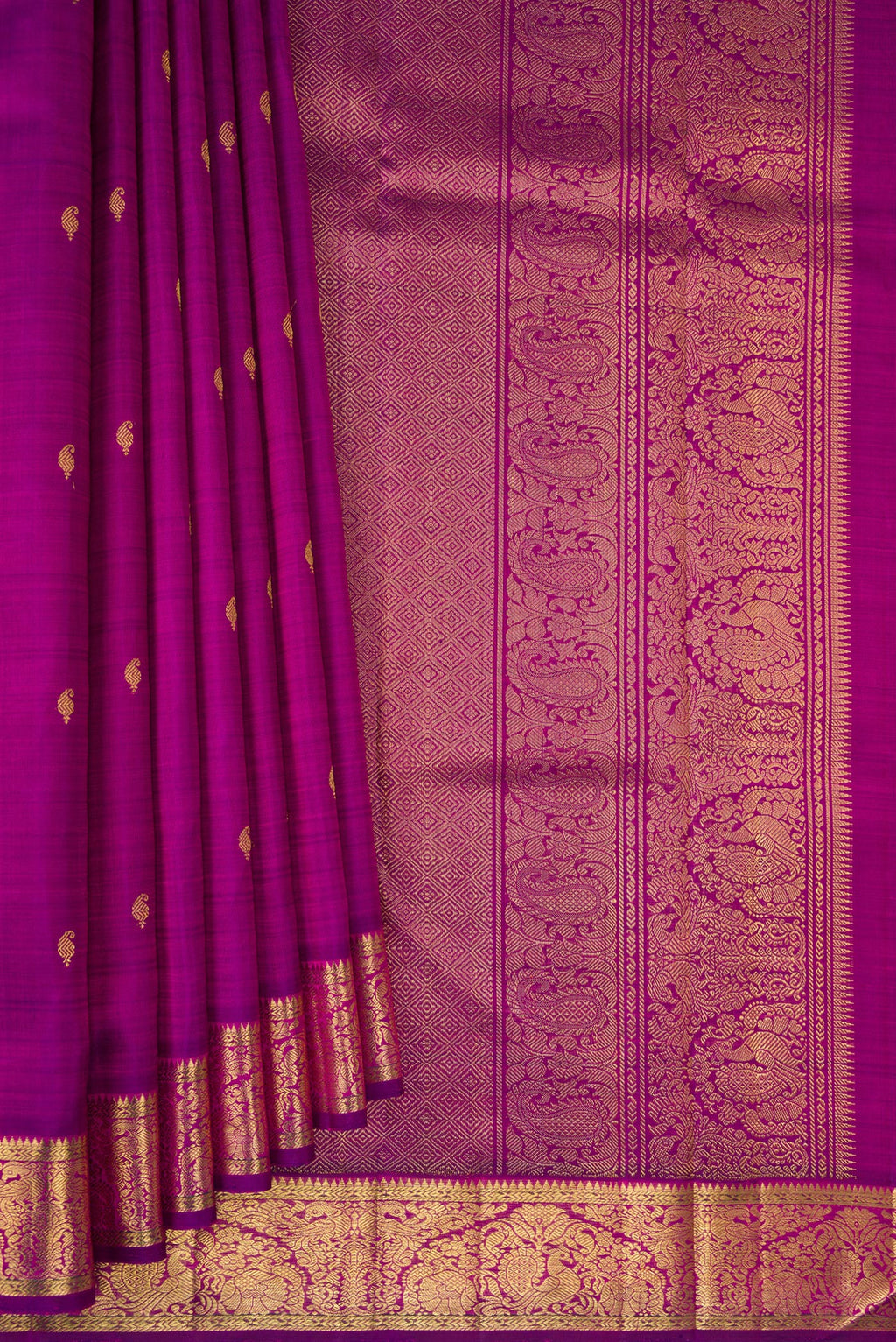 Pleats and pallu of Pure Silk Pure Zari Purple Kanchipuram Saree with Zari Butta on the body and Zari Border. 