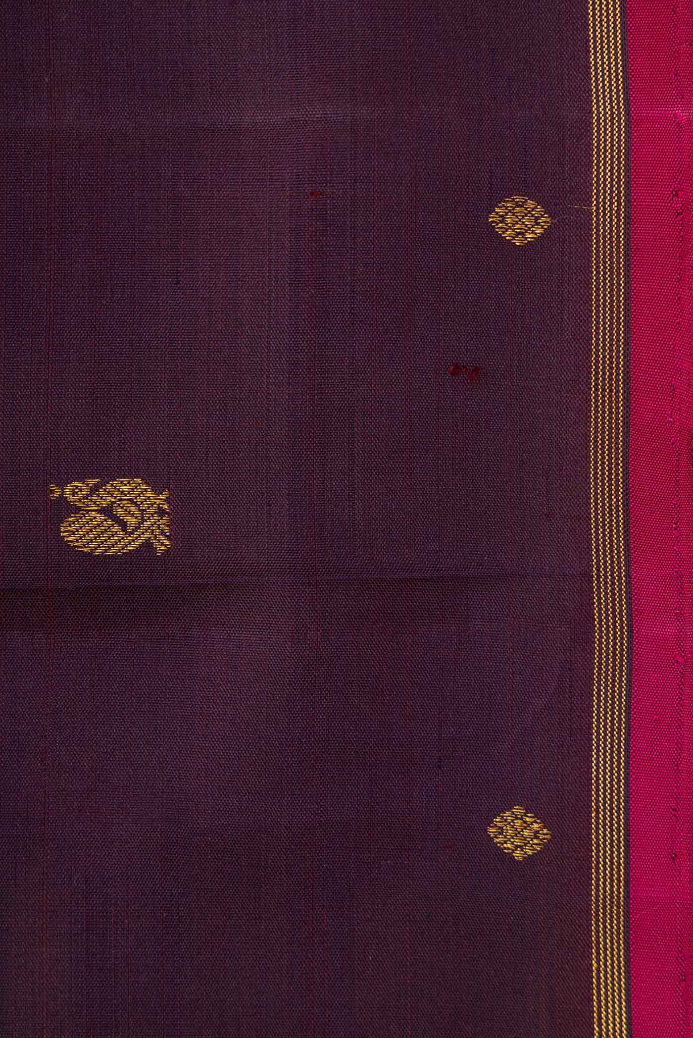 Border image of Pure Silk Pure Zari Burgundy Dual Tone Kanchipuram Saree with Zari Butta on the body and Thin Zari Line