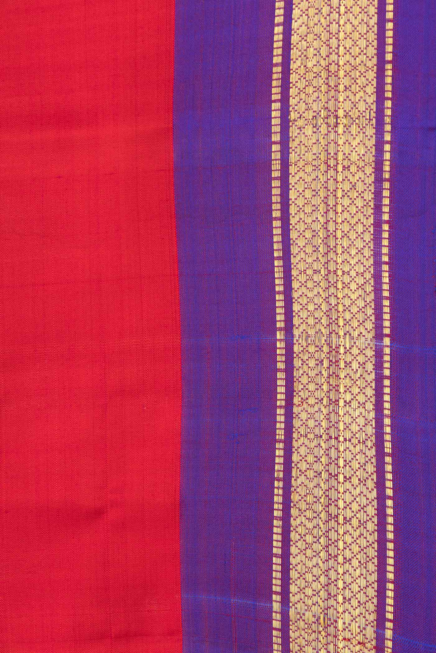 Border image of Red Dual Tone Kanchipuram Saree with Plain Body and Zari Border. 