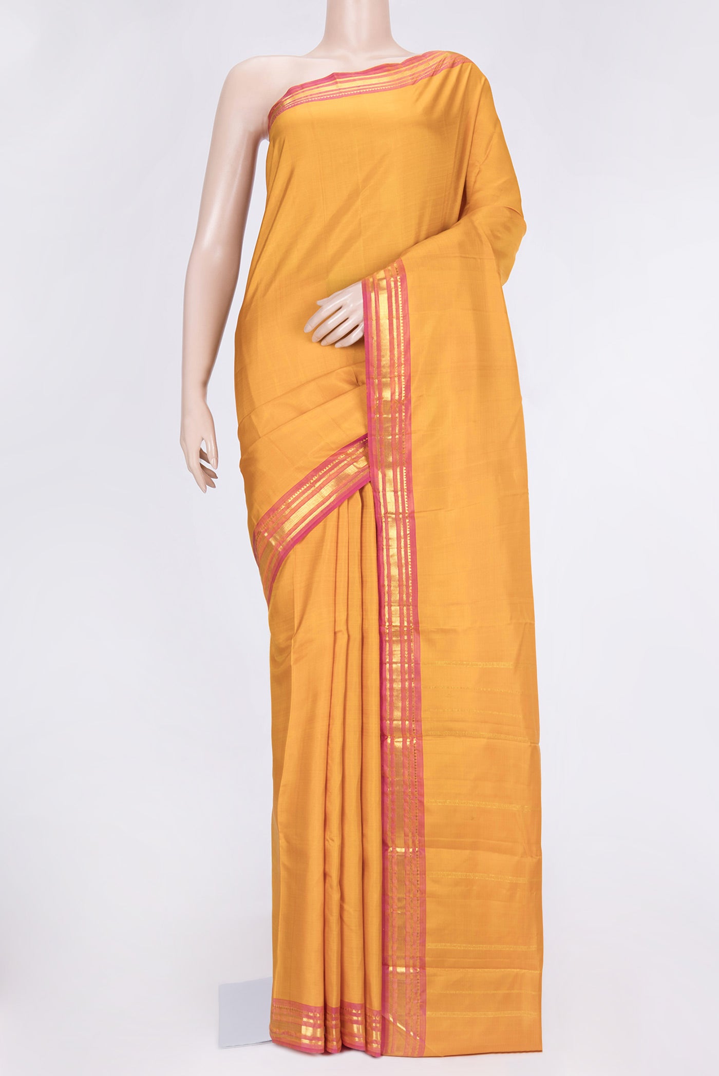 Maroon Dual Tone Kanchipuram Saree with Plain Body and Zari Border.  displayed on a mannequin