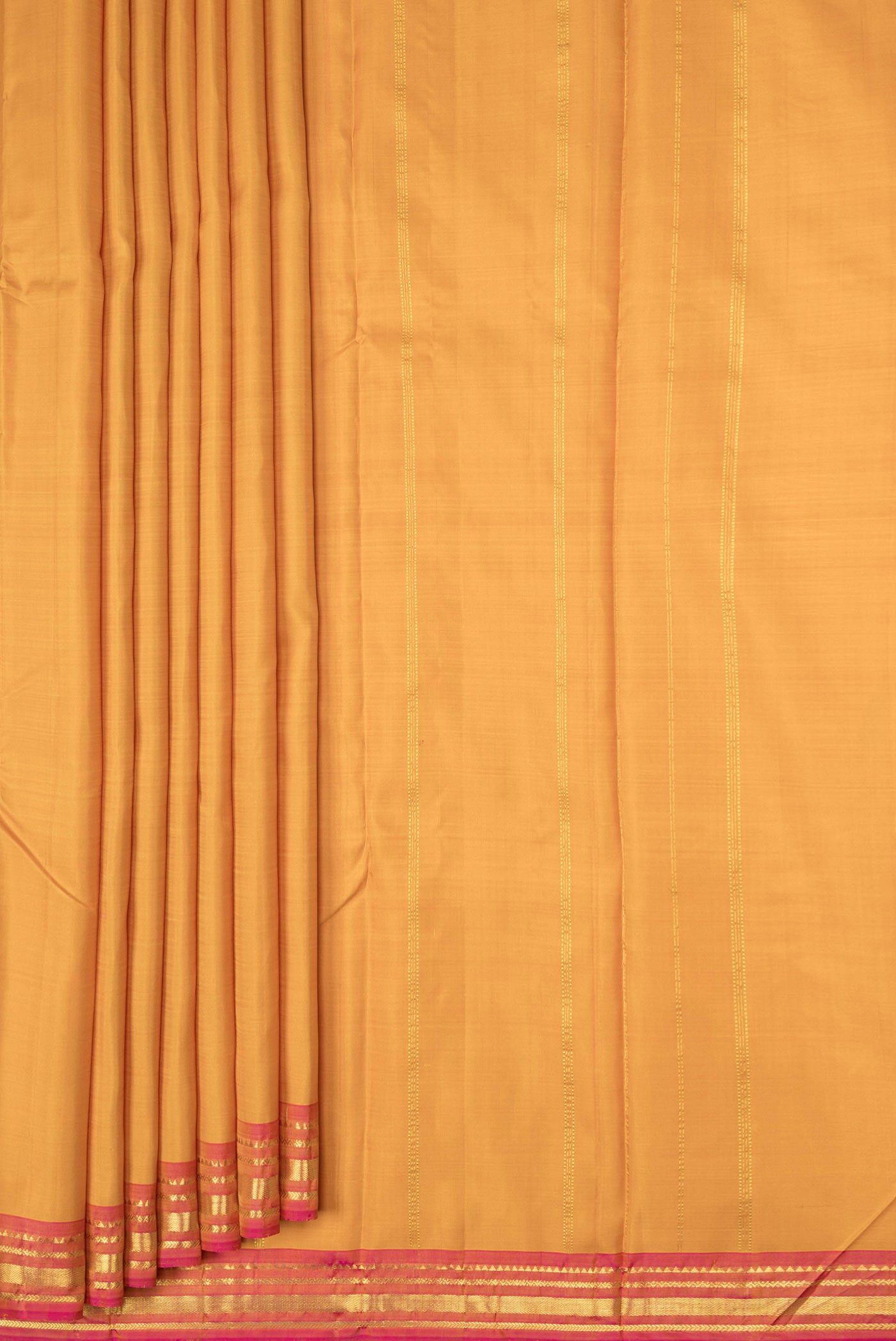 Pleats and pallu of Maroon Dual Tone Kanchipuram Saree with Plain Body and Zari Border. 