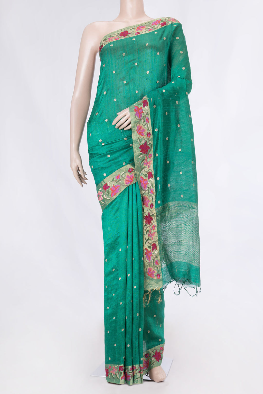 Green Tussar Silk Saree with Embroidery on the body and Embroidery Border displayed on a mannequin