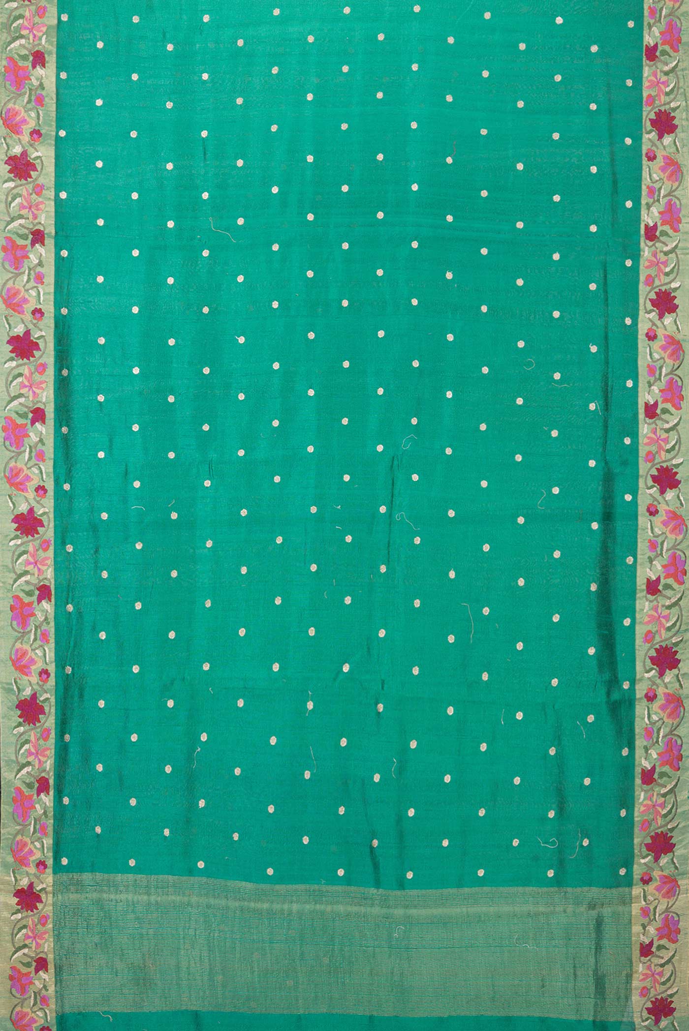 Flat view of Green Tussar Silk Saree with Embroidery on the body and Embroidery Border