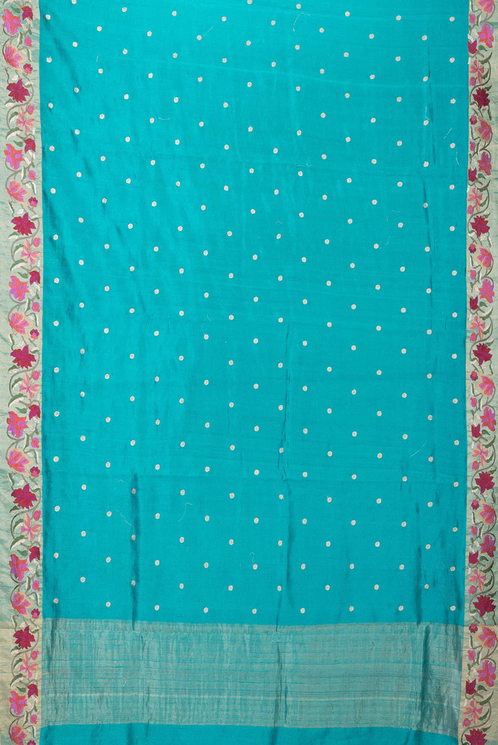 Flat view of Blue Tussar Silk Saree with Embroidery on the body and Embroidery Border