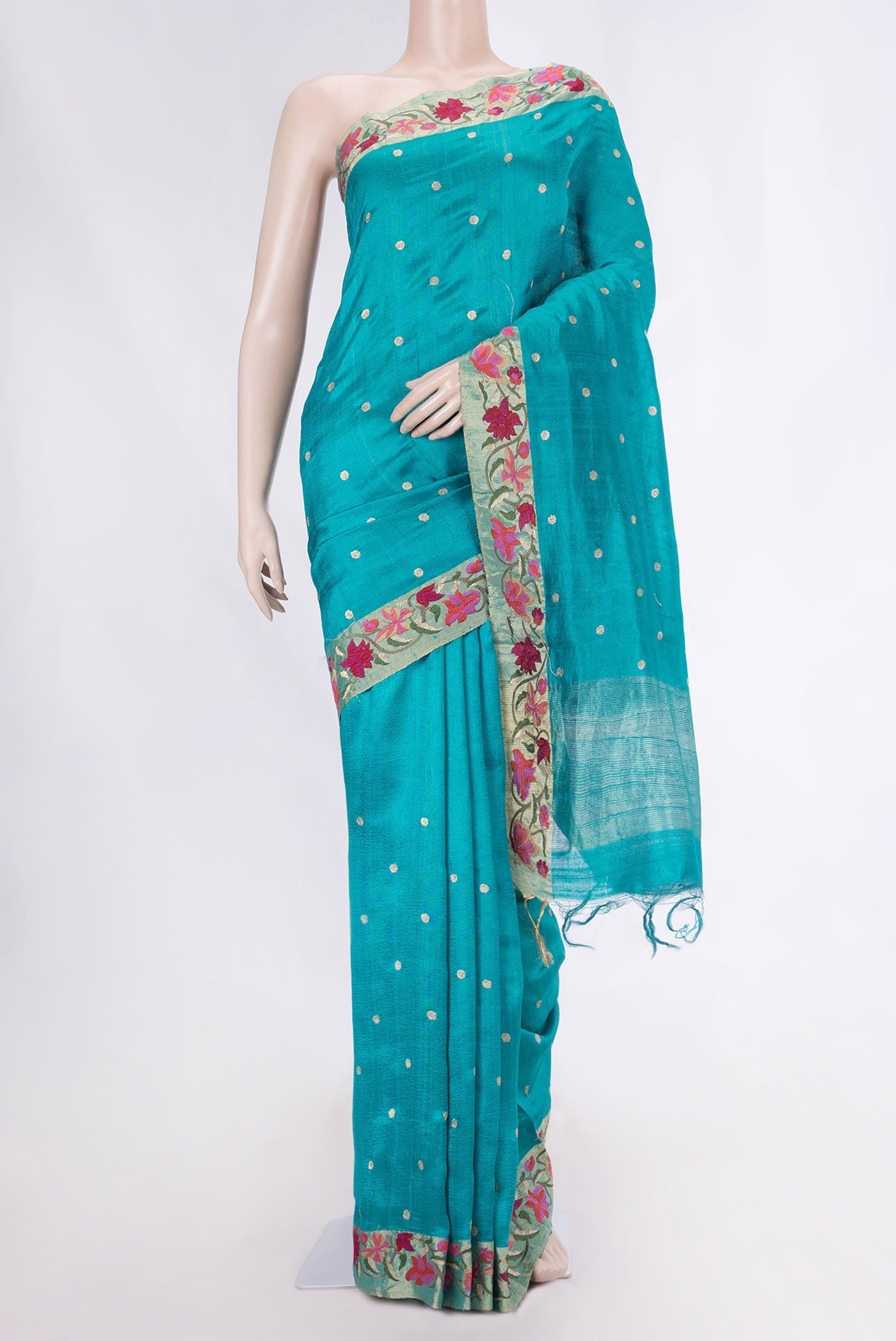 Sky Blue Dual Tone Tussar Saree with Zari Butta on the body and Embroidery Border displayed on a mannequin