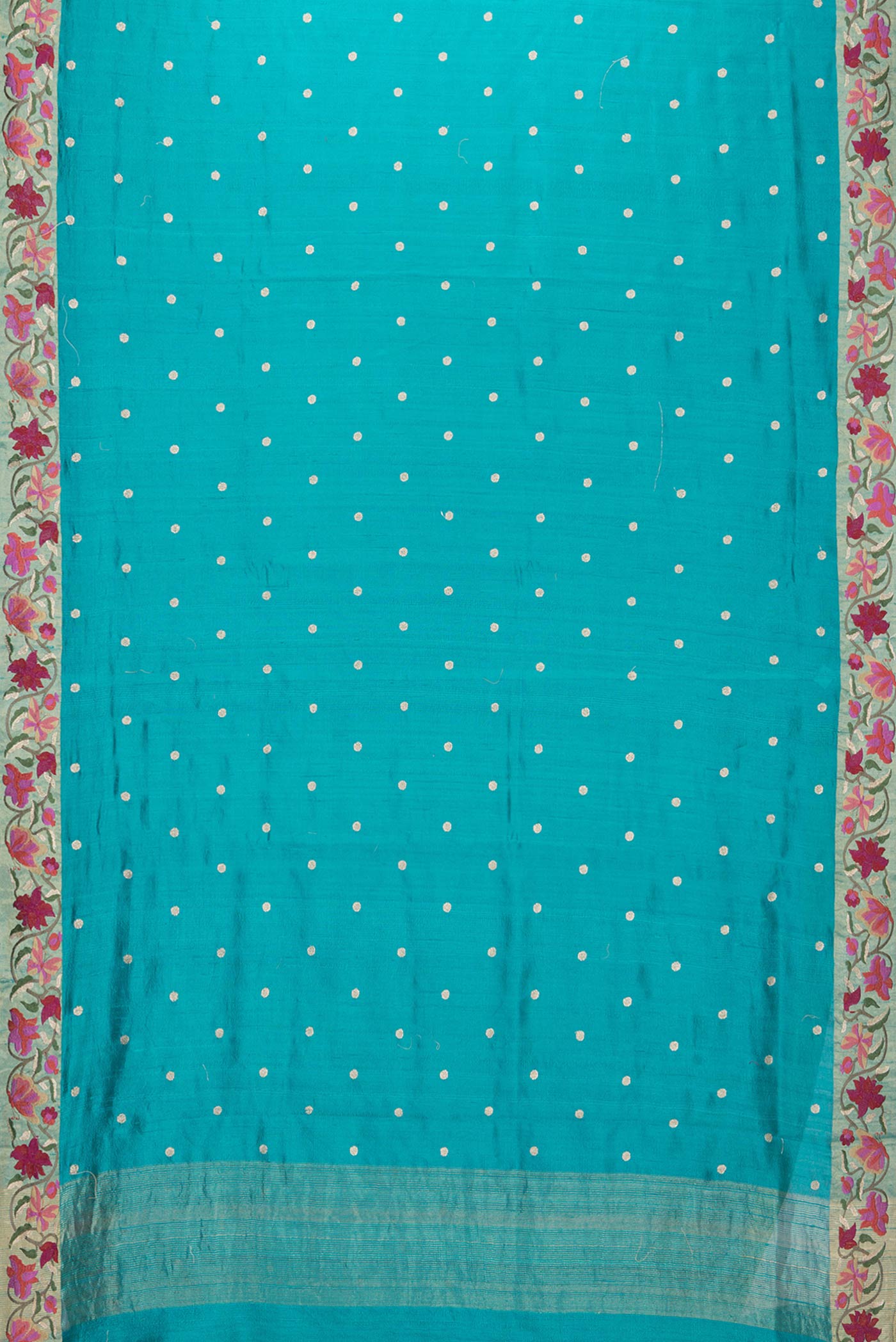 Flat view of Sky Blue Dual Tone Tussar Saree with Zari Butta on the body and Embroidery Border