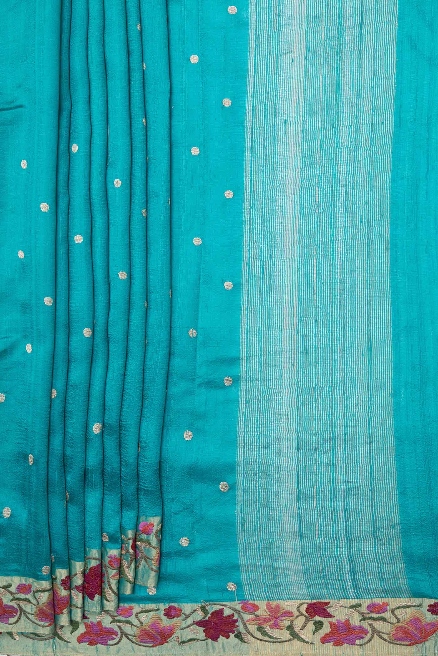 Pleats and pallu of Sky Blue Dual Tone Tussar Saree with Zari Butta on the body and Embroidery Border