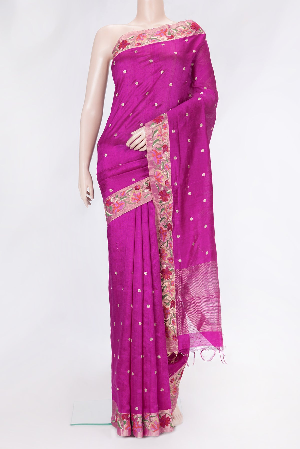 Magenta Dual Tone Tussar Silk Saree with Zari Butta on the body and Embroidery Border.  displayed on a mannequin