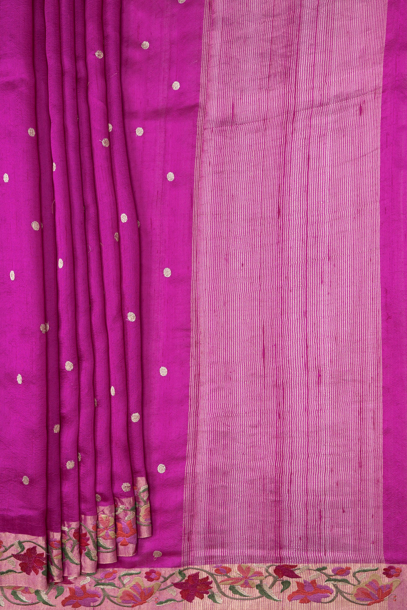 Pleats and pallu of Magenta Dual Tone Tussar Silk Saree with Zari Butta on the body and Embroidery Border. 