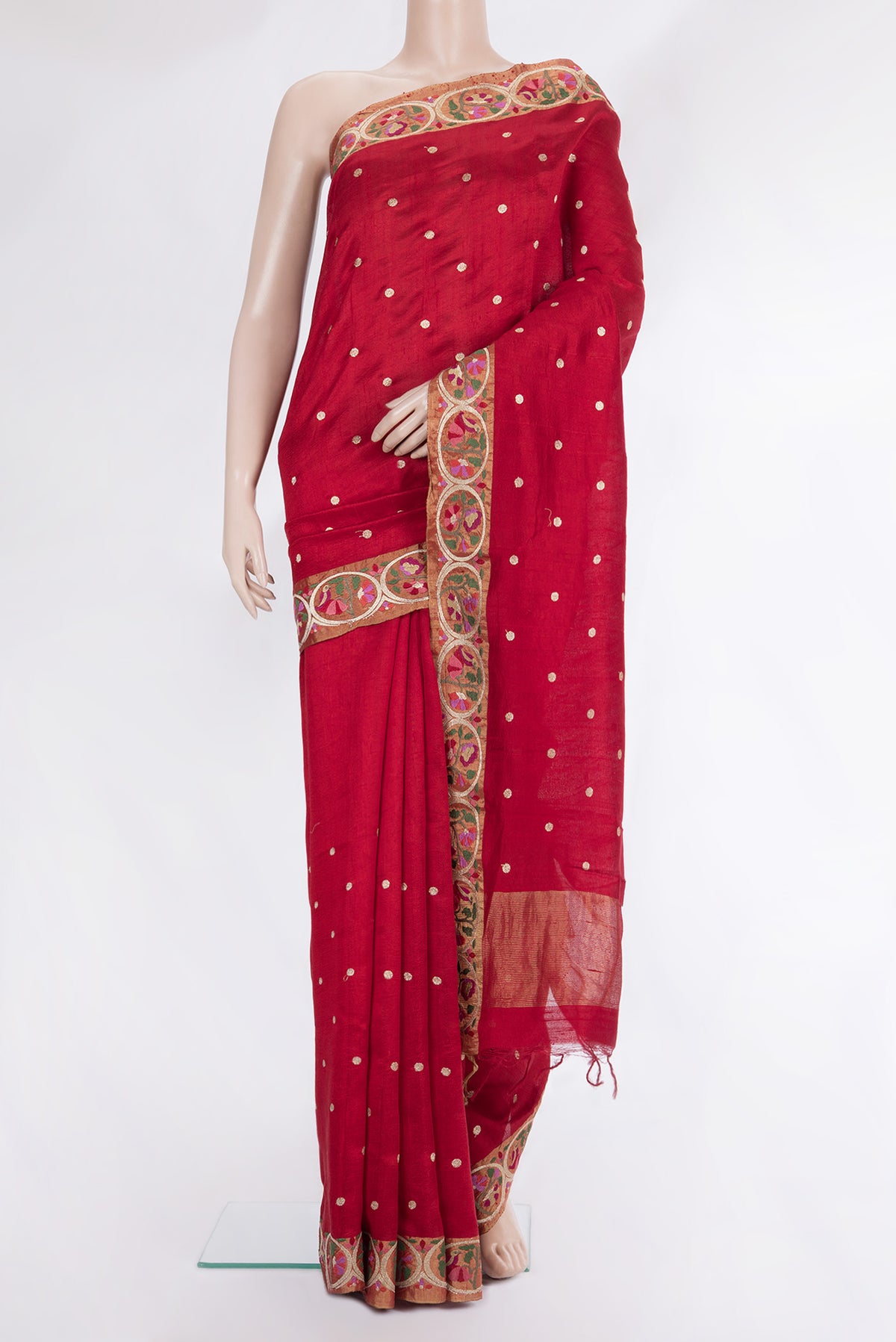 Pure Silk Red Tussar Saree with Zari Butta on the body and Embroidery Border.  displayed on a mannequin