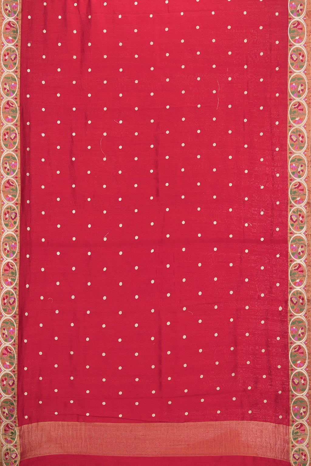 Flat view of Pure Silk Red Tussar Saree with Zari Butta on the body and Embroidery Border. 
