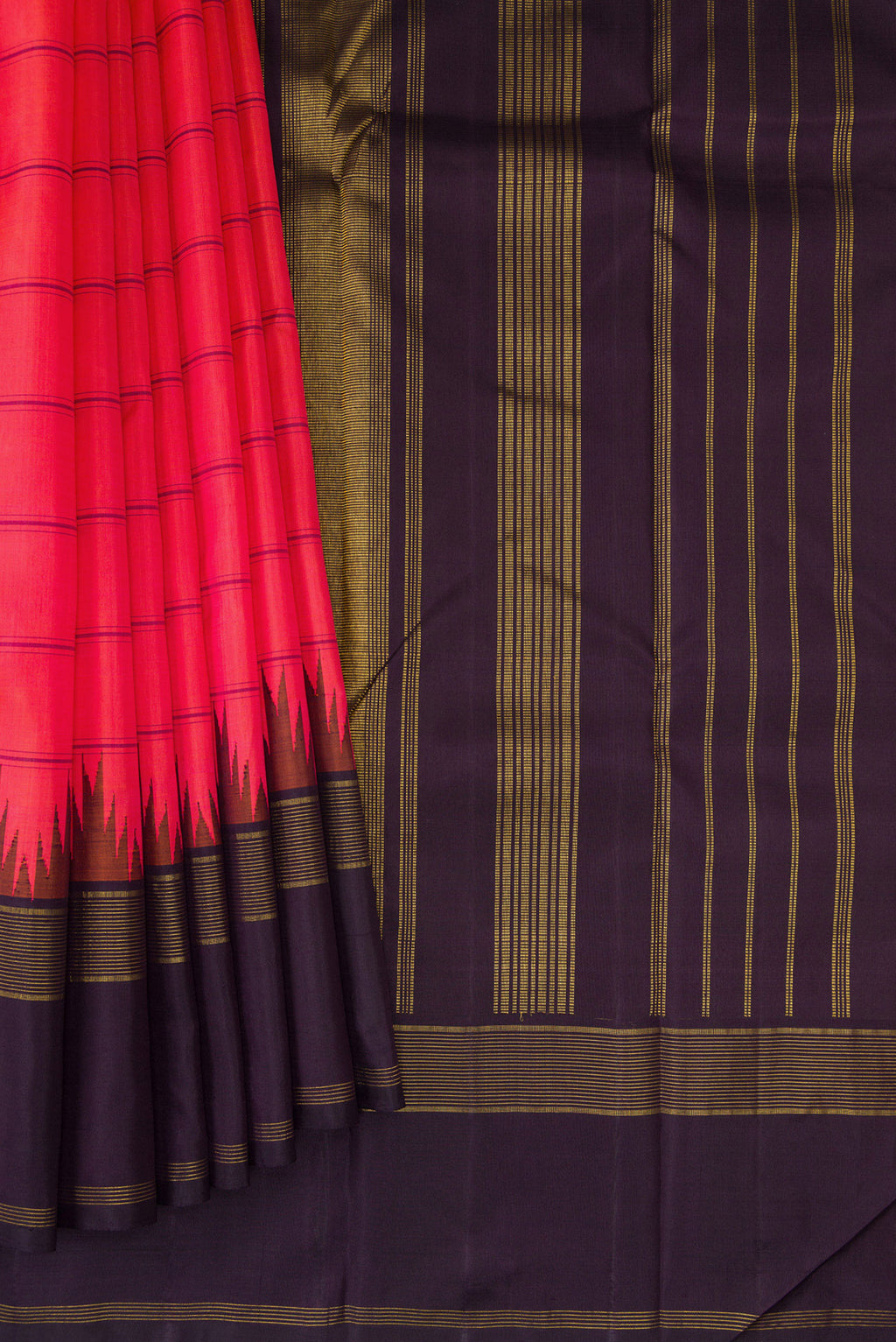 Pleats and pallu of Coral Dual Tone Kanjivaram Silk Saree with Stripes on the body and Ganga Jamuna Border. 