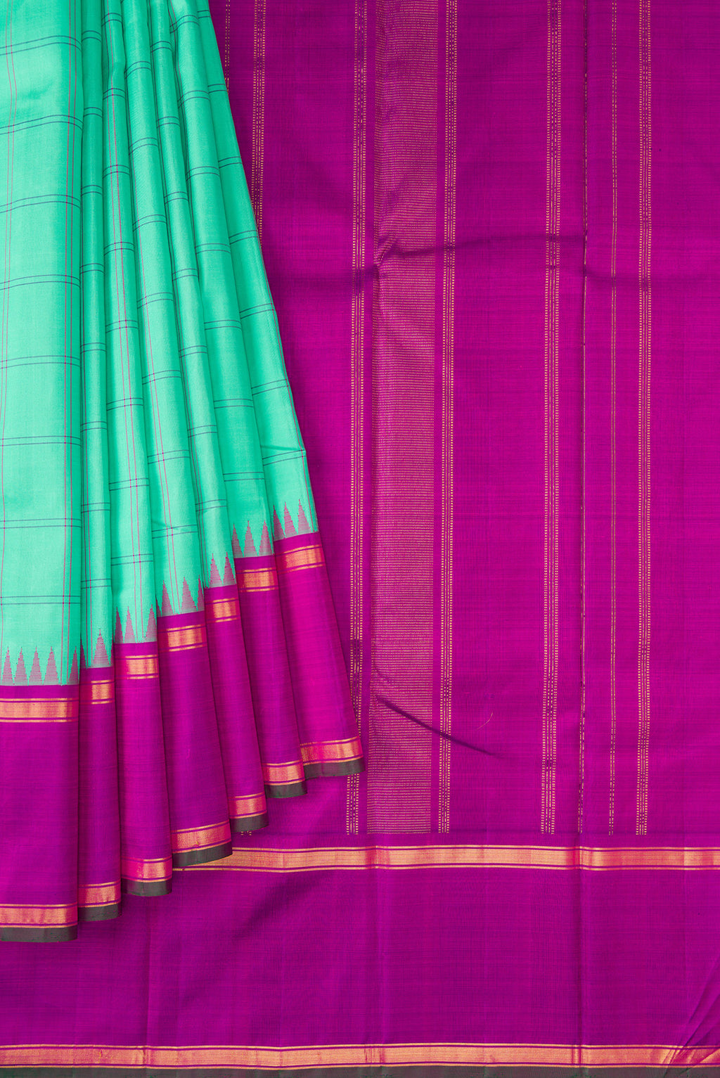 Pleats and pallu of Pure Silk Pure Zari Sea Green Dual Tone Kanjivaram Saree with Checked design on the body and Zari And Thread Border. 