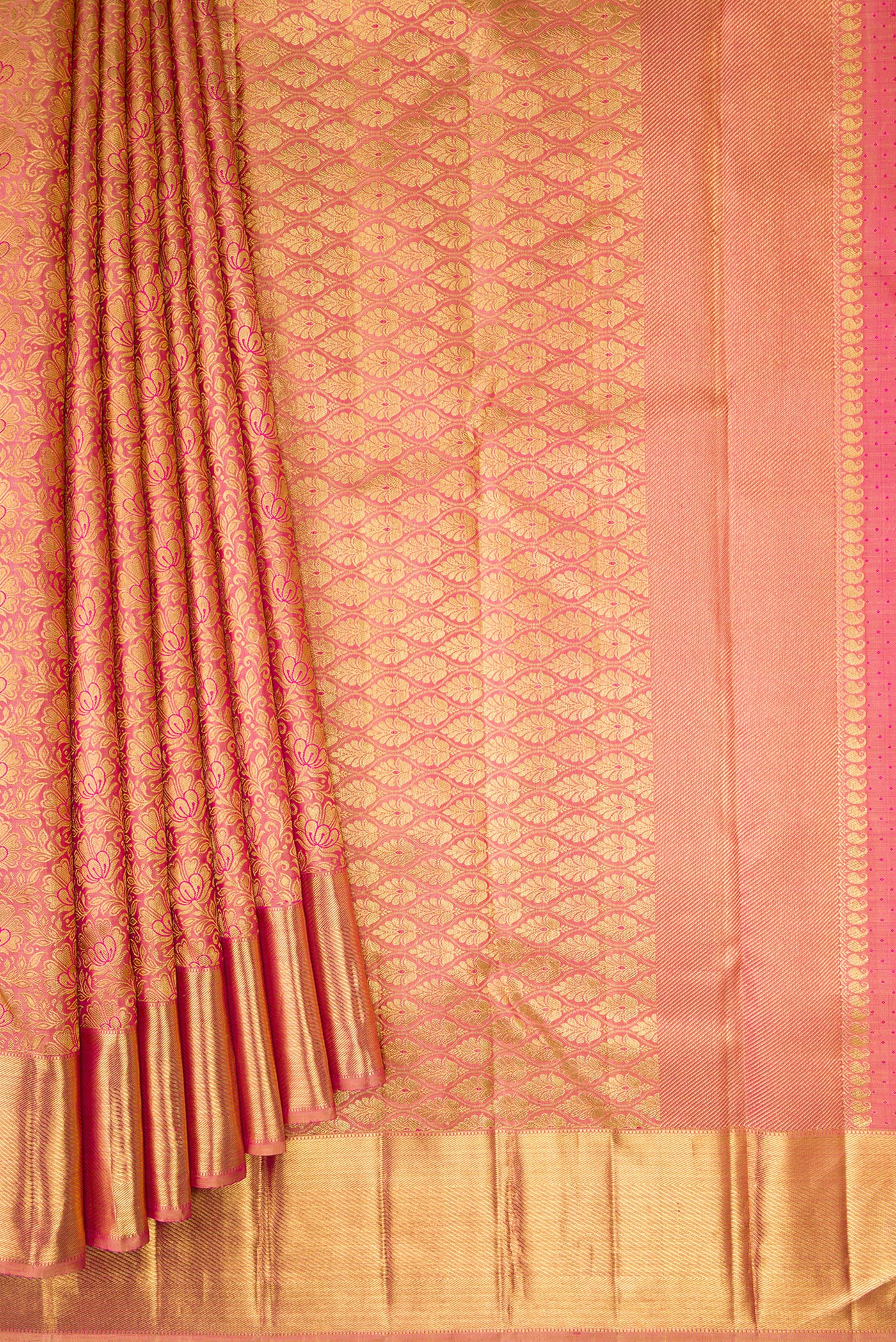 Pleats and pallu of Pure Silk Pure Zari Rose Gold Dual Tone Kanjivaram Saree with Zari Brocade on the body and Zari Border. 
