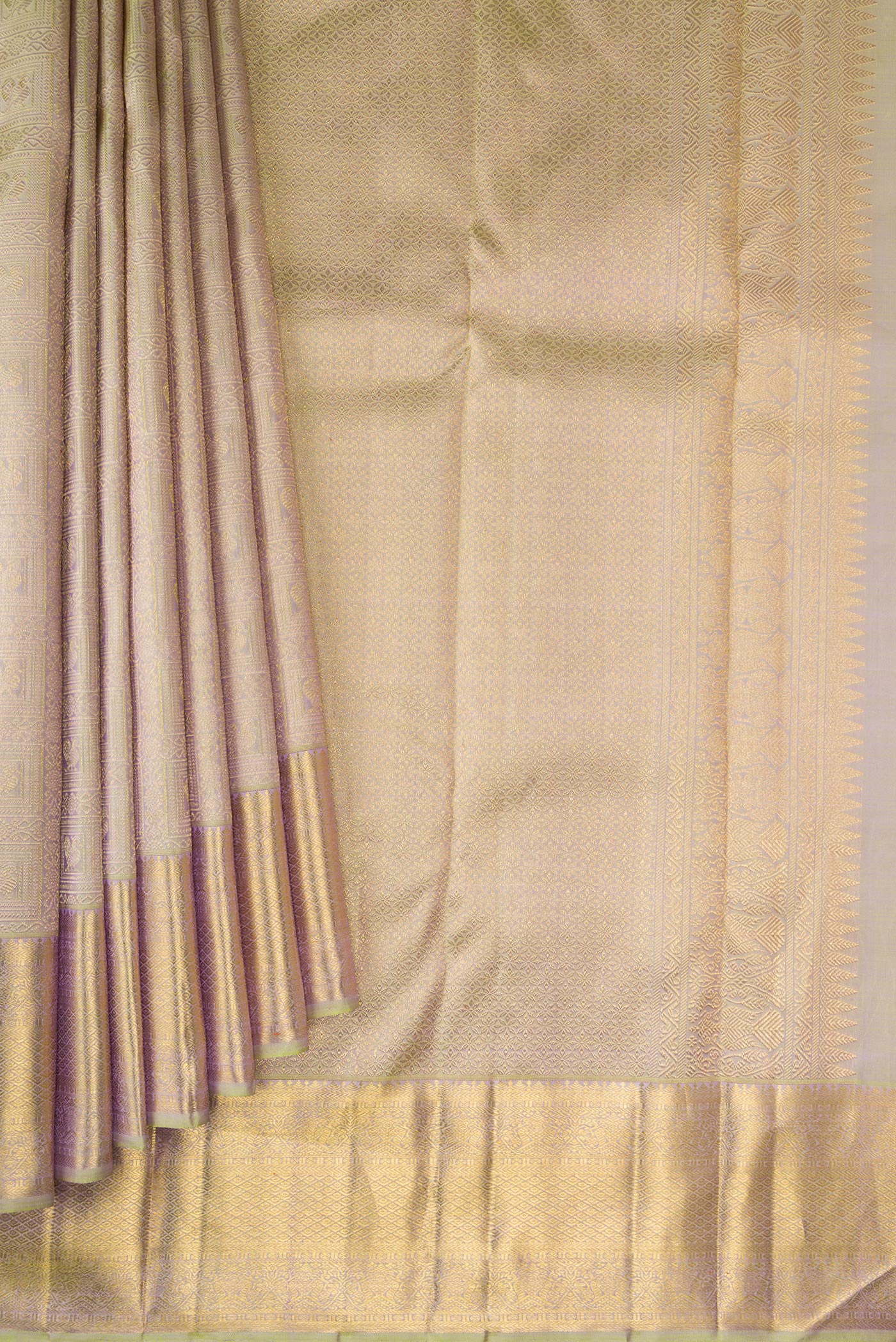 Pleats and pallu of Pure Silk Pure Zari Light Green Dual Tone Kanjivaram Saree with Zari Brocade on the body and Zari Border. 