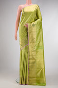 Pure Silk Pure Zari Light Green Dual Tone Kanjivaram Saree with Zari Brocade on the body and Zari Border.  displayed on a mannequin