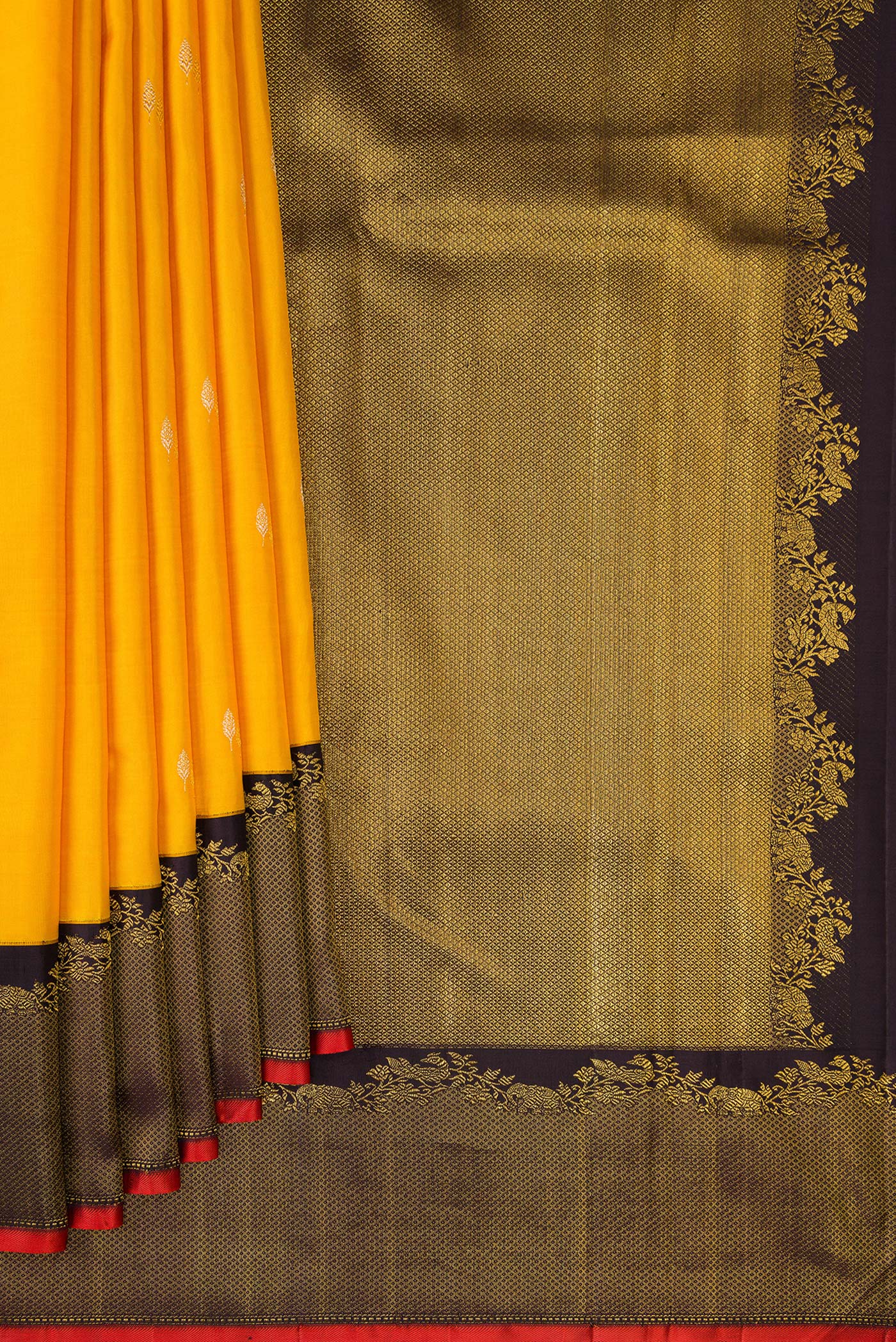 Pleats and pallu of Pure Silk Pure Zari Yellow Kanjivaram Saree with Zari Butta on the body and Zari Border. 