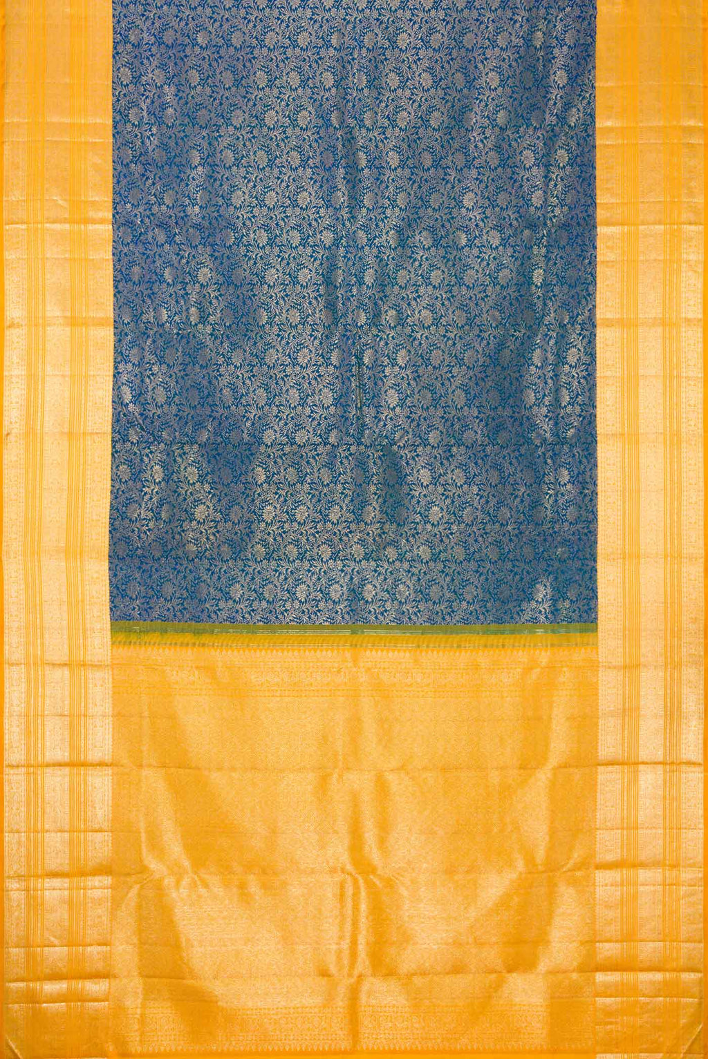 Flat view of Peacock Blue Dual Tone Kanchipuram Silk Saree with Zari Brocade on the body and Zari Border. 
