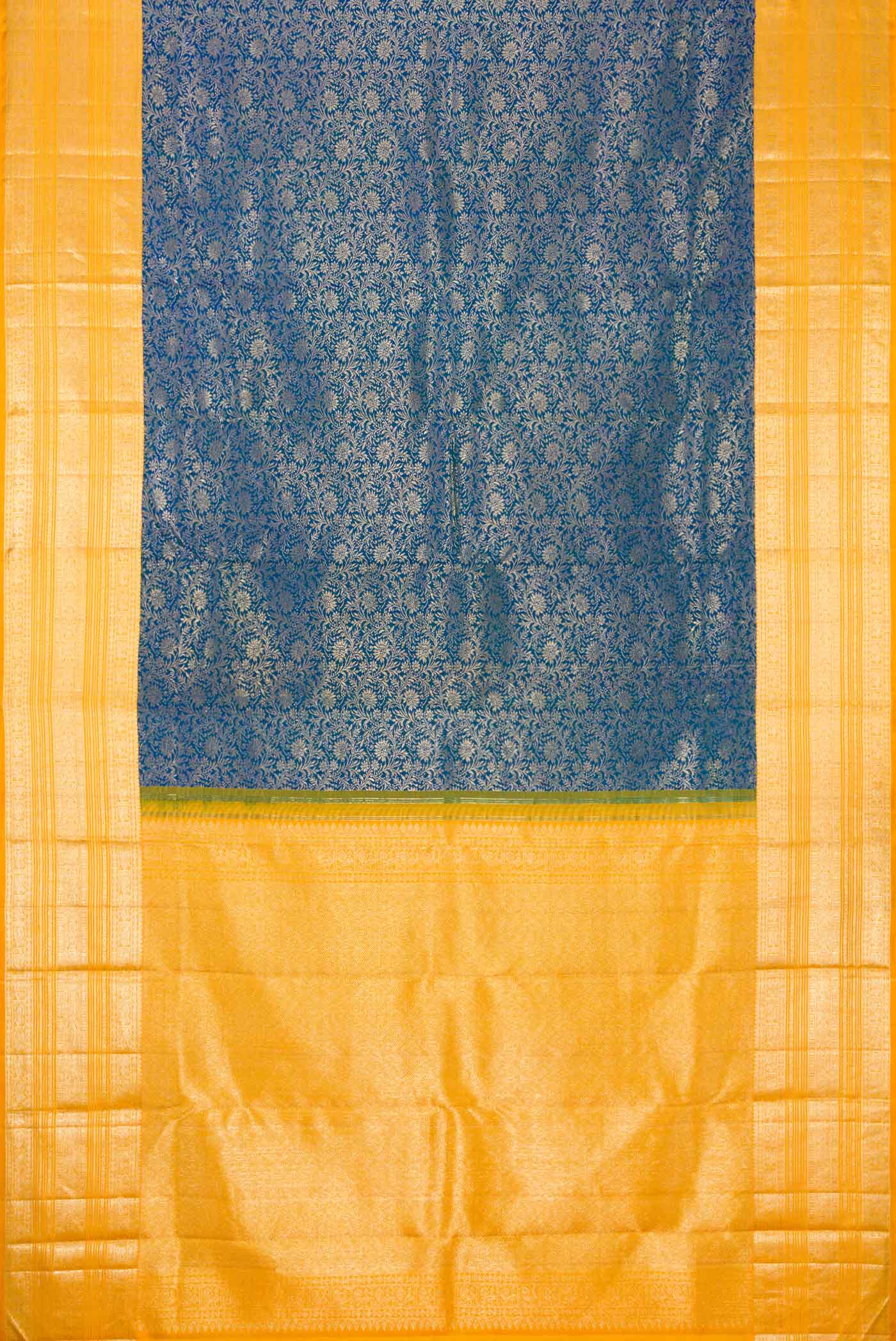 Flat view of Peacock Blue Dual Tone Kanchipuram Silk Saree with Zari Brocade on the body and Zari Border. 
