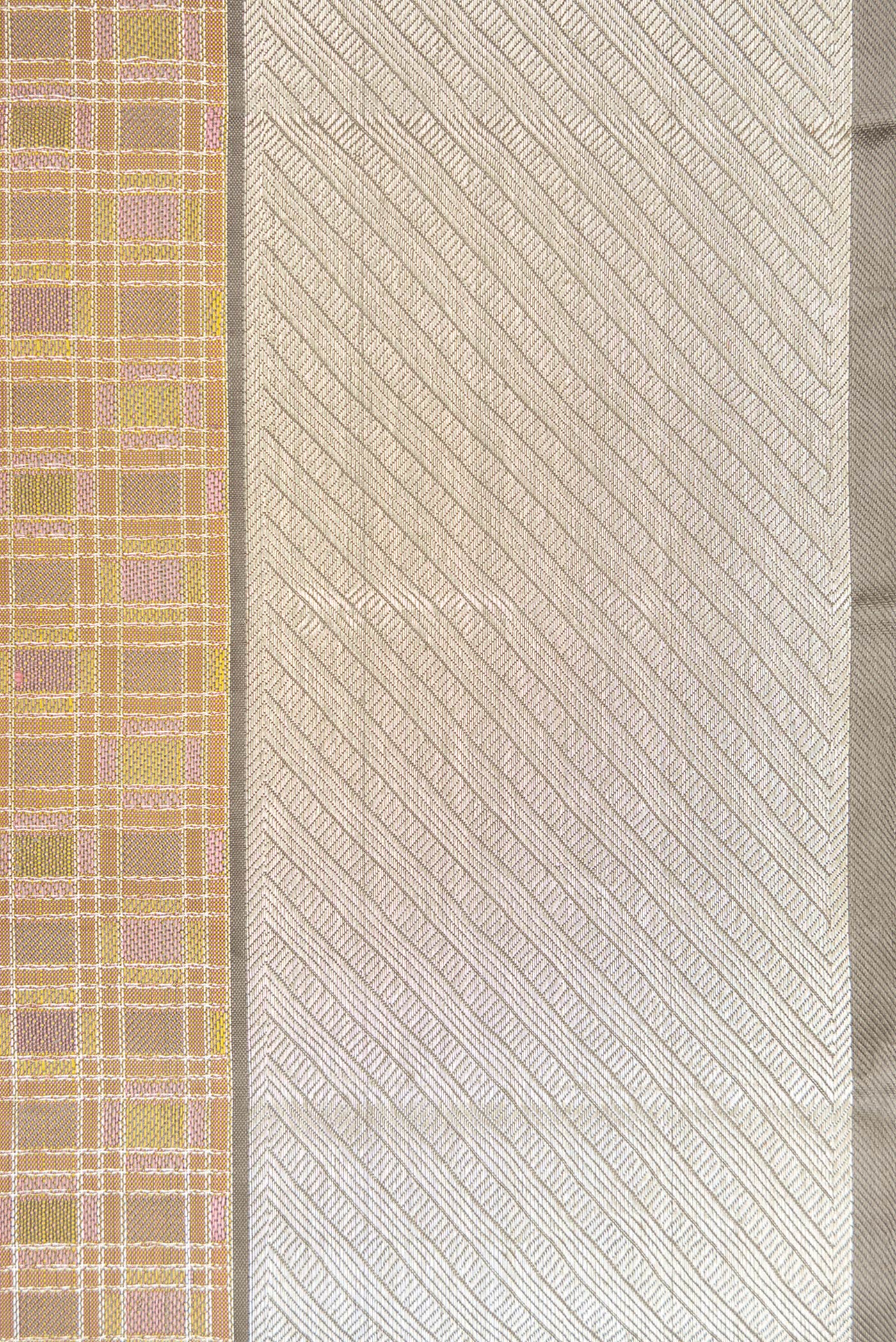 Border image of Gold Dual Tone Kanjivaram Silk Saree with Checked design on the body and Zari Border. 