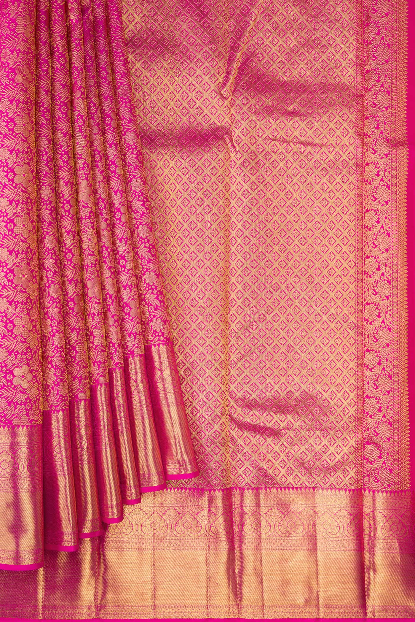 Pleats and pallu of Pink Kanchipuram Silk Saree with Zari Brocade on the body and Zari Border. 