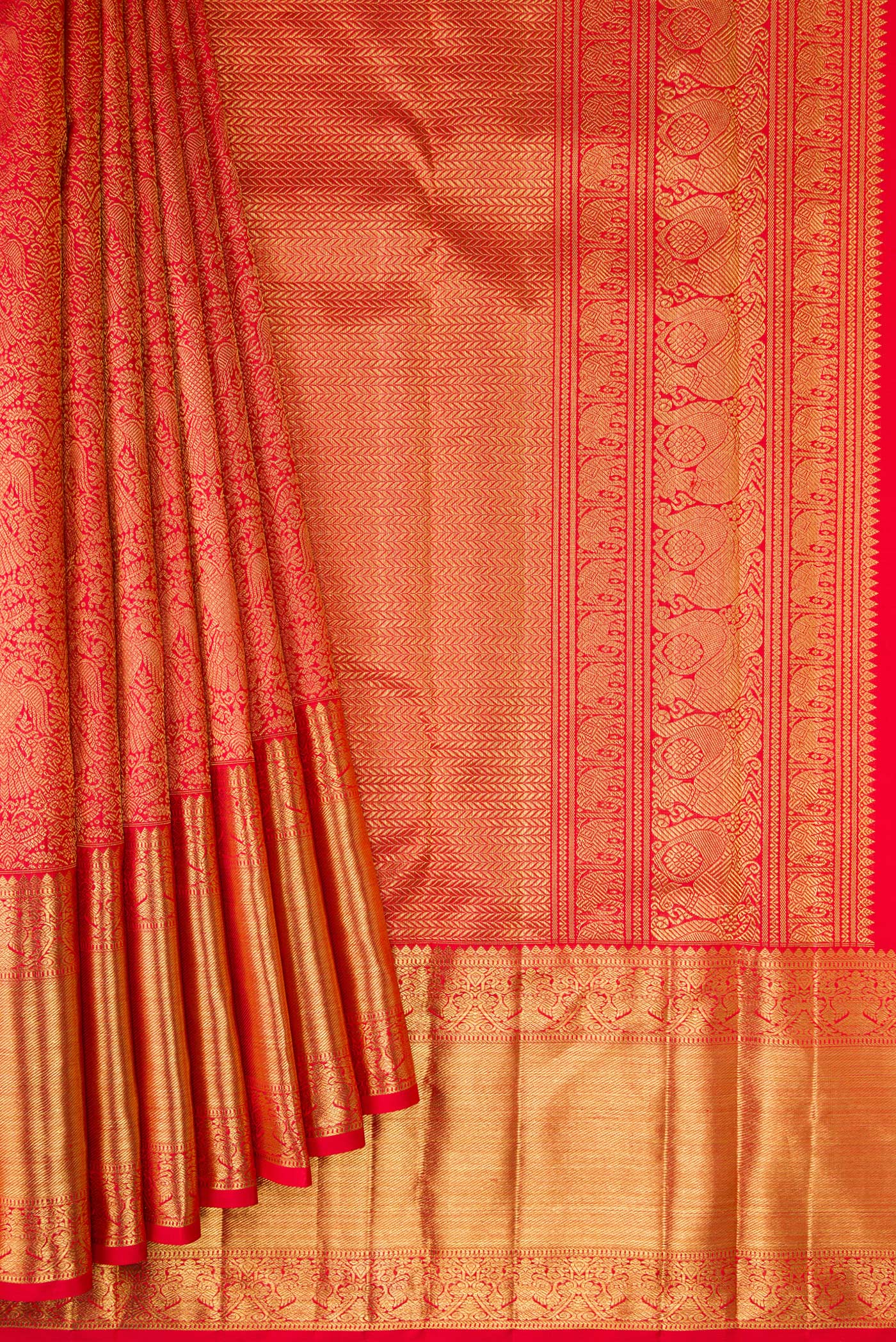 Pleats and pallu of Pure Silk Pure Zari Red Dual Tone Kanjivaram Saree with Zari Brocade on the body and Zari Border. 