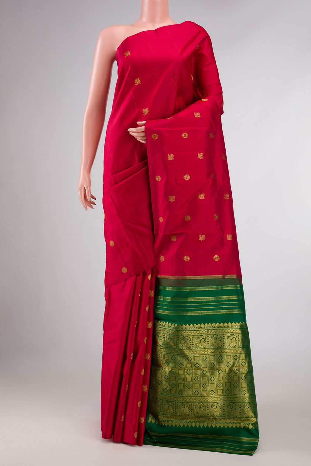 Maroon Dual Tone Kanchipuram Silk Saree with Zari Butta on the body and Without Border displayed on a mannequin