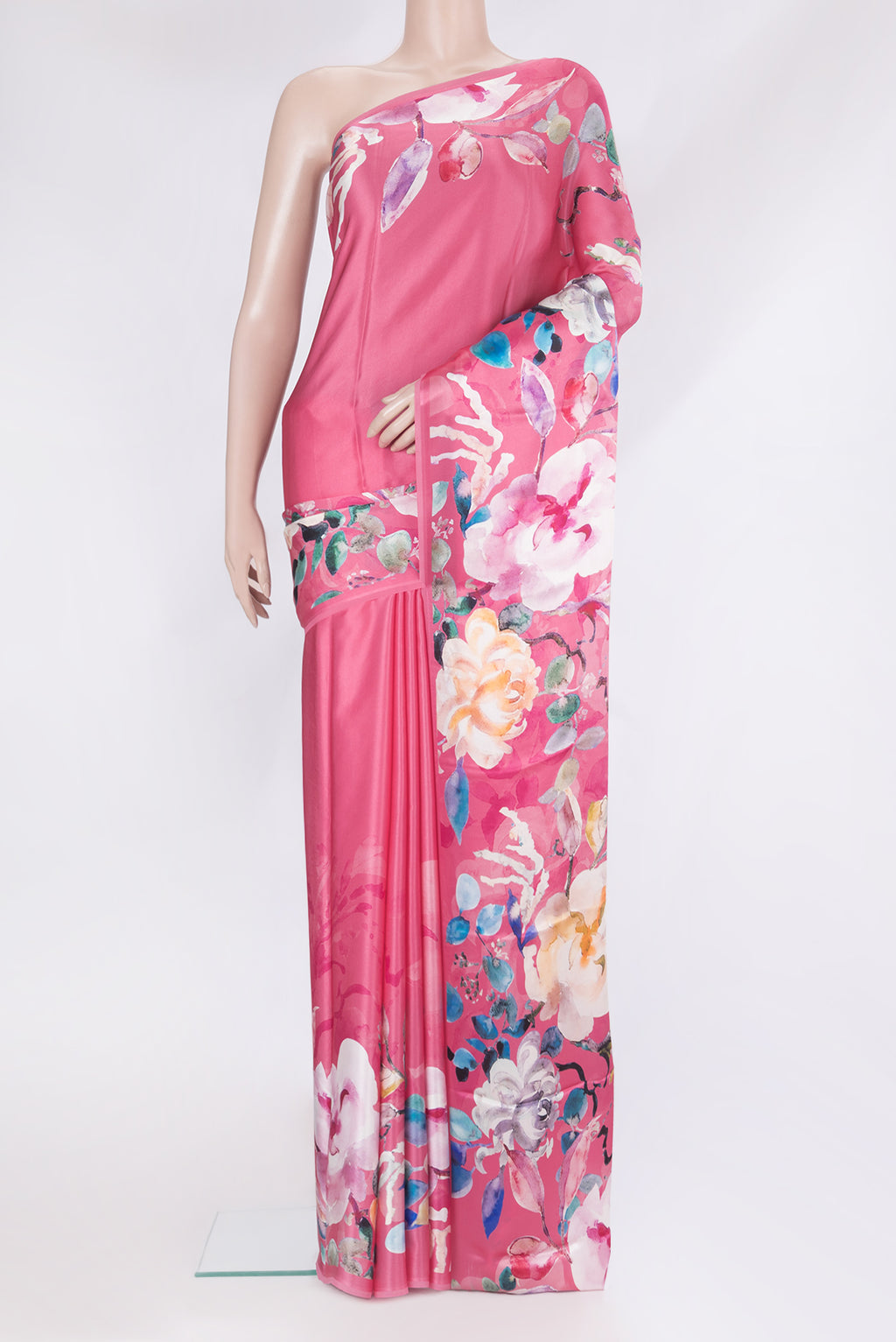 Pink Crepe Saree with Printed design on the body and Without Border.  displayed on a mannequin