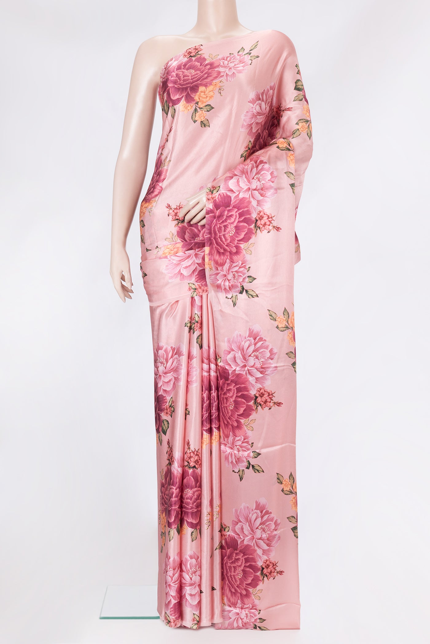 Rose Gold Dual Tone Crepe Saree with Printed design on the body and Without Border.  displayed on a mannequin