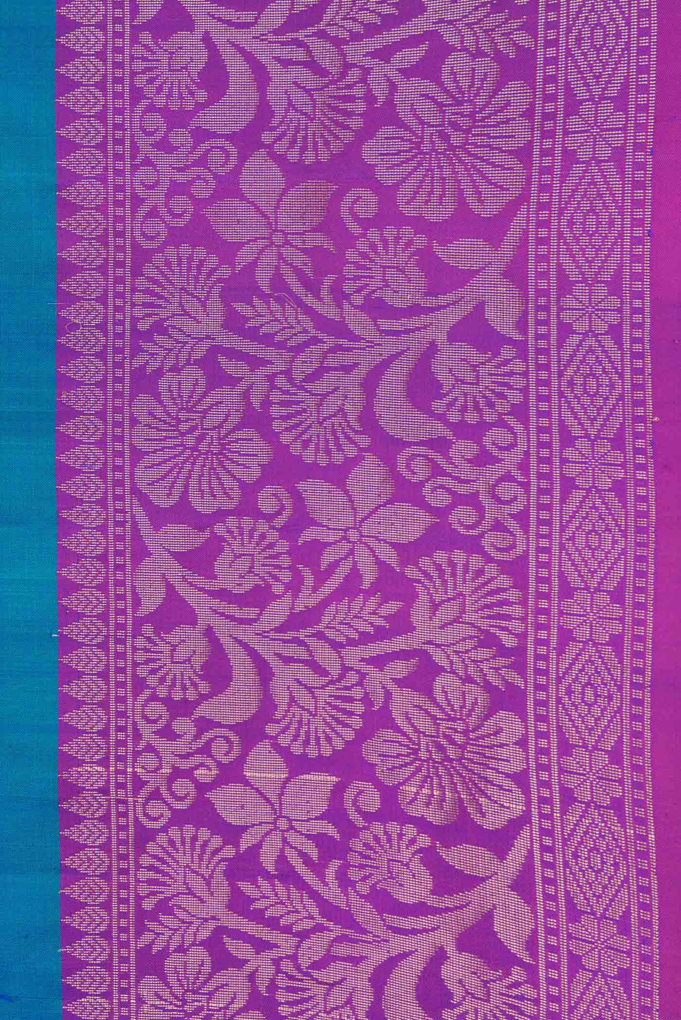 Border image of Peacock Blue Dual Tone Soft Silk Saree with Zari Butta on the body and Fancy Border. 