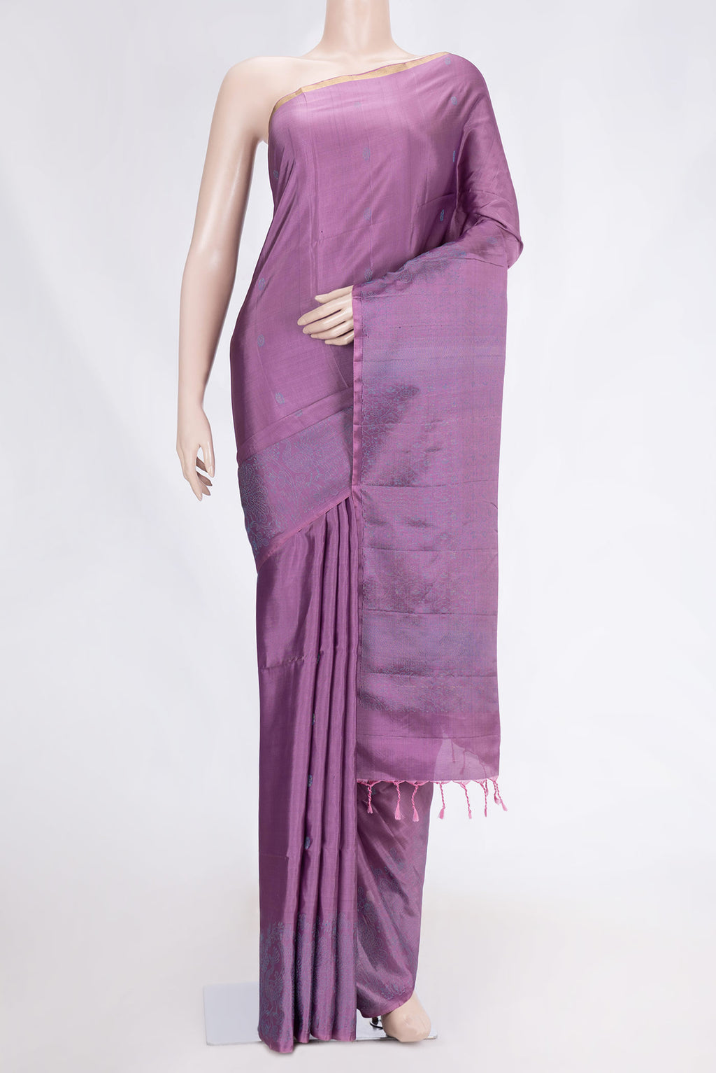 Purple Dual Tone Soft Silk Saree with Zari Butta on the body and Thin Zari Line.  displayed on a mannequin